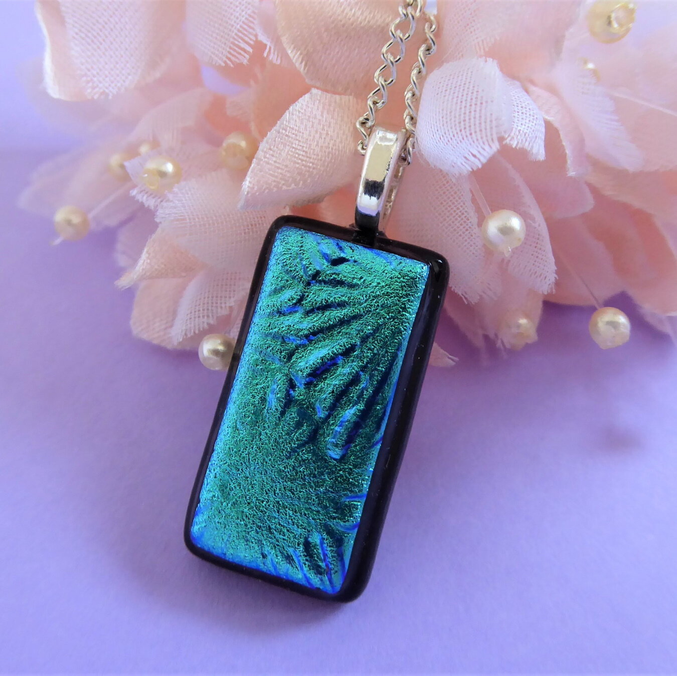 Teal green and black fused glass pendant