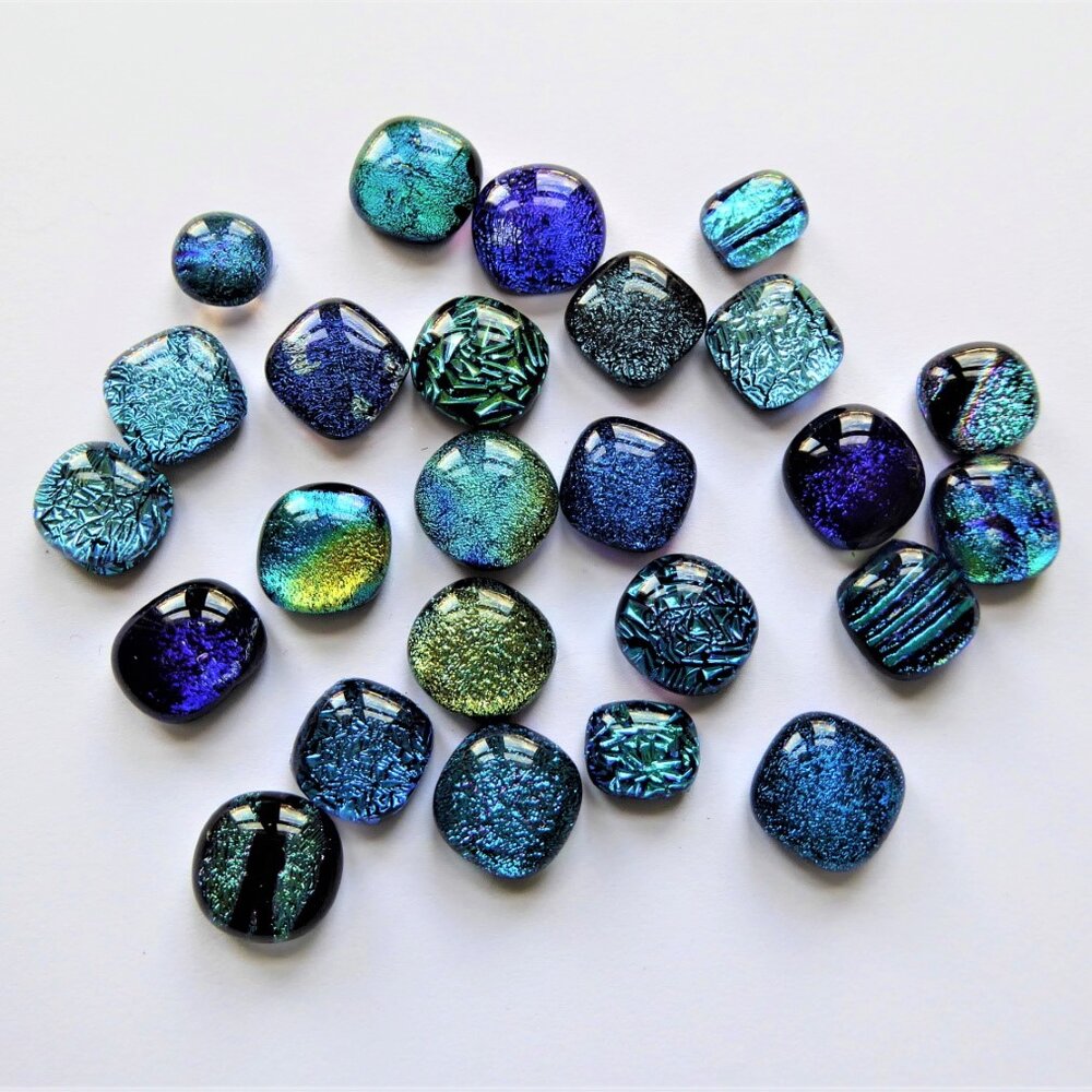 Shiny test pebbles in blue and green shades