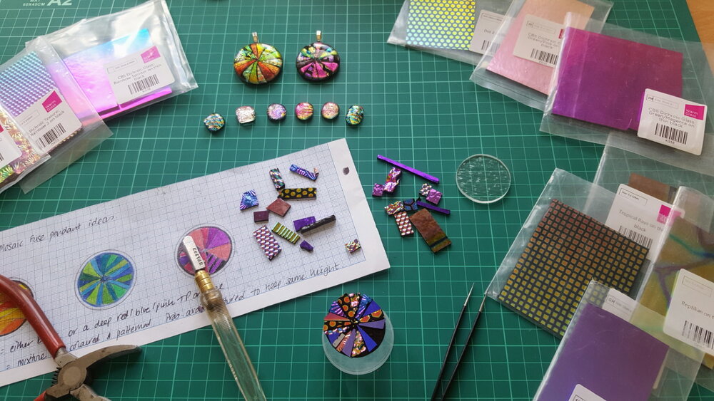 Assembling circular pendants from small pieces of dichroic glass