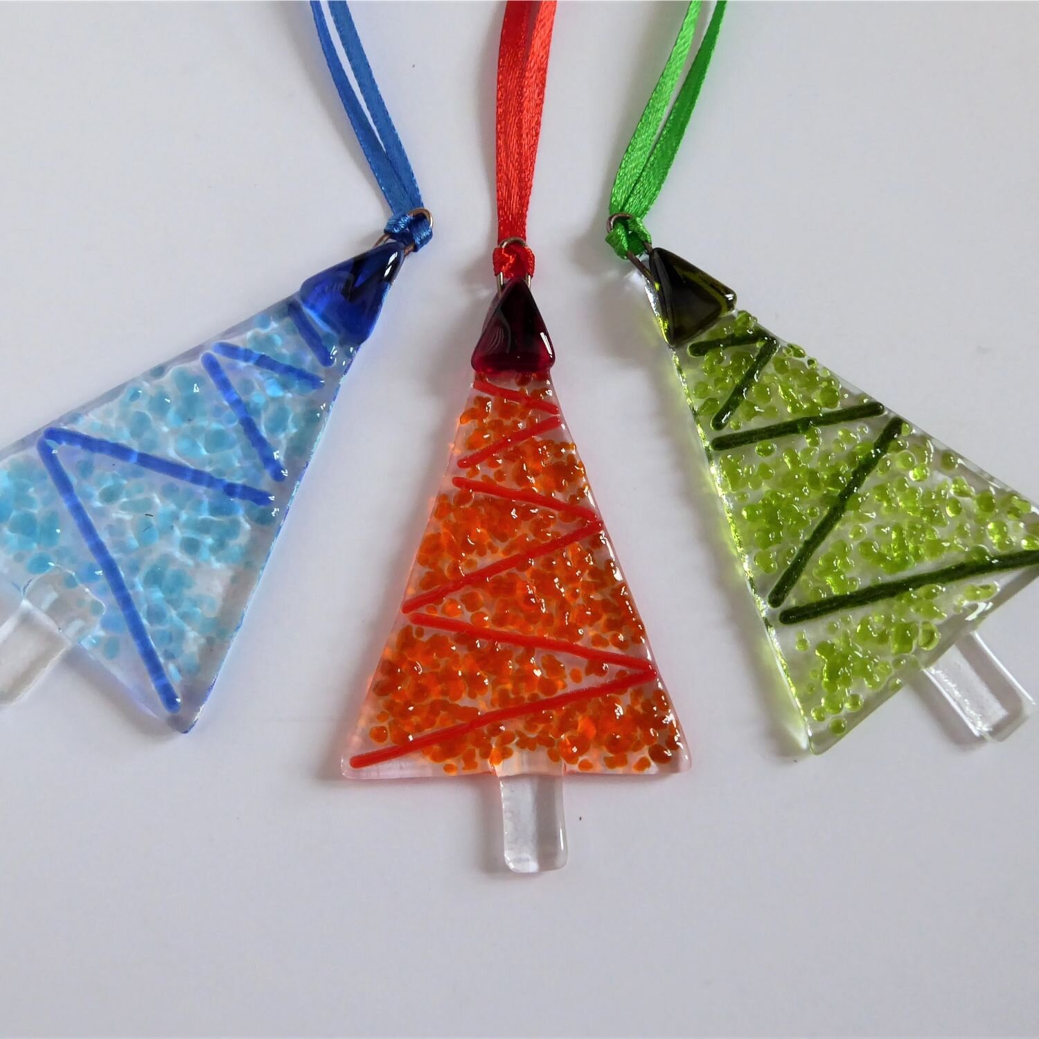  Eva Glass Design fused glass tree-shaped Christmas decorations with a tinsel effect in three colour schemes 