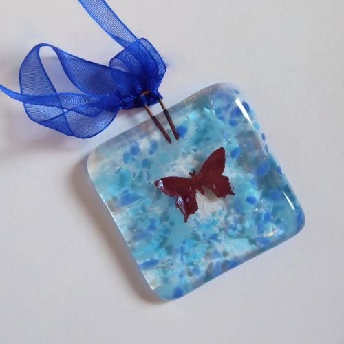Blue butterfly hanging