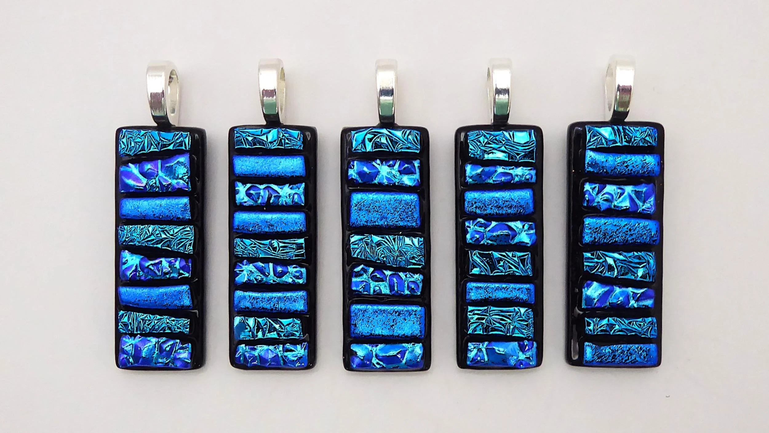eva-glass-design-blue-dichroic-glass-pendants.jpg