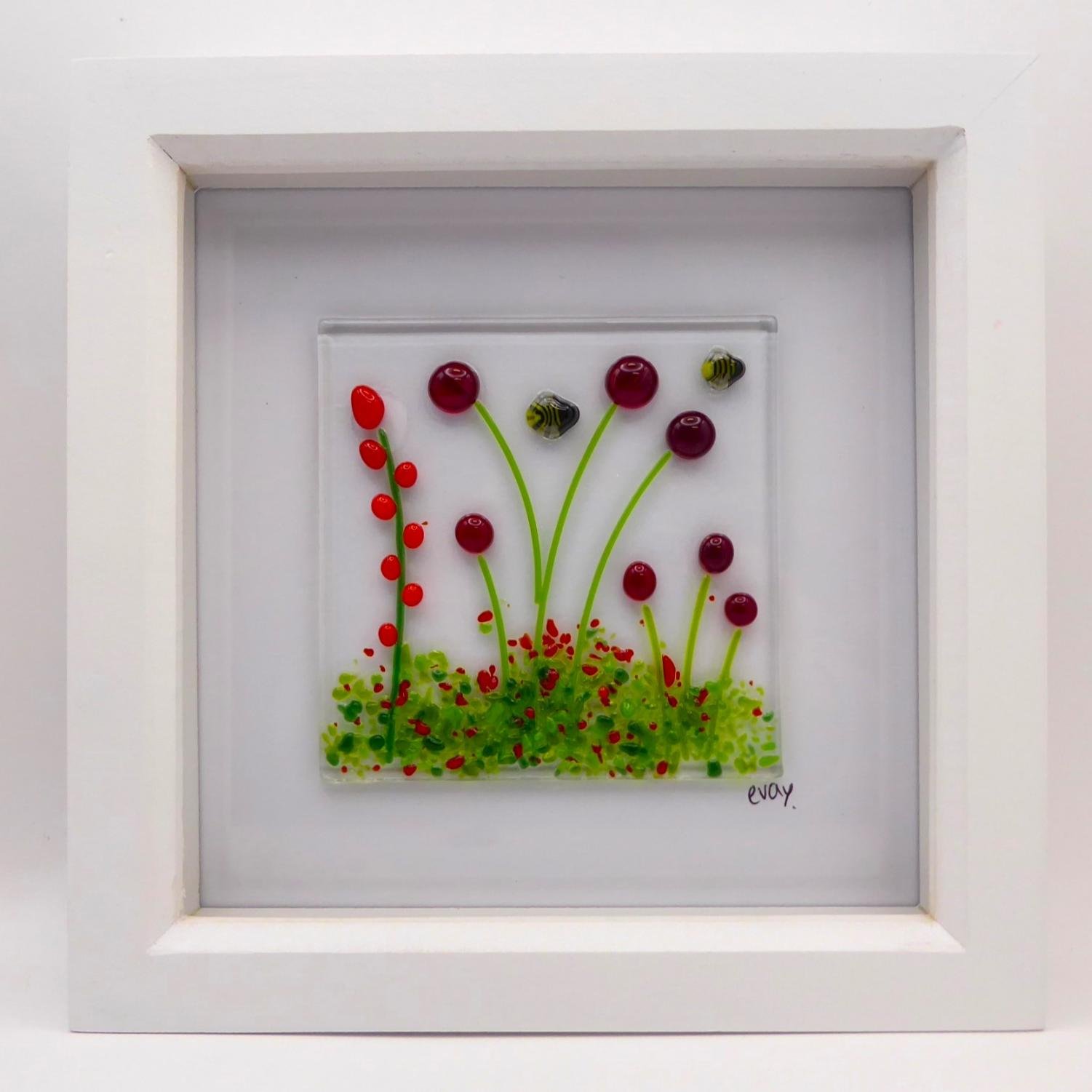  Framed fused glass wildflower meadow picture with bees and red flowers on a clear background 