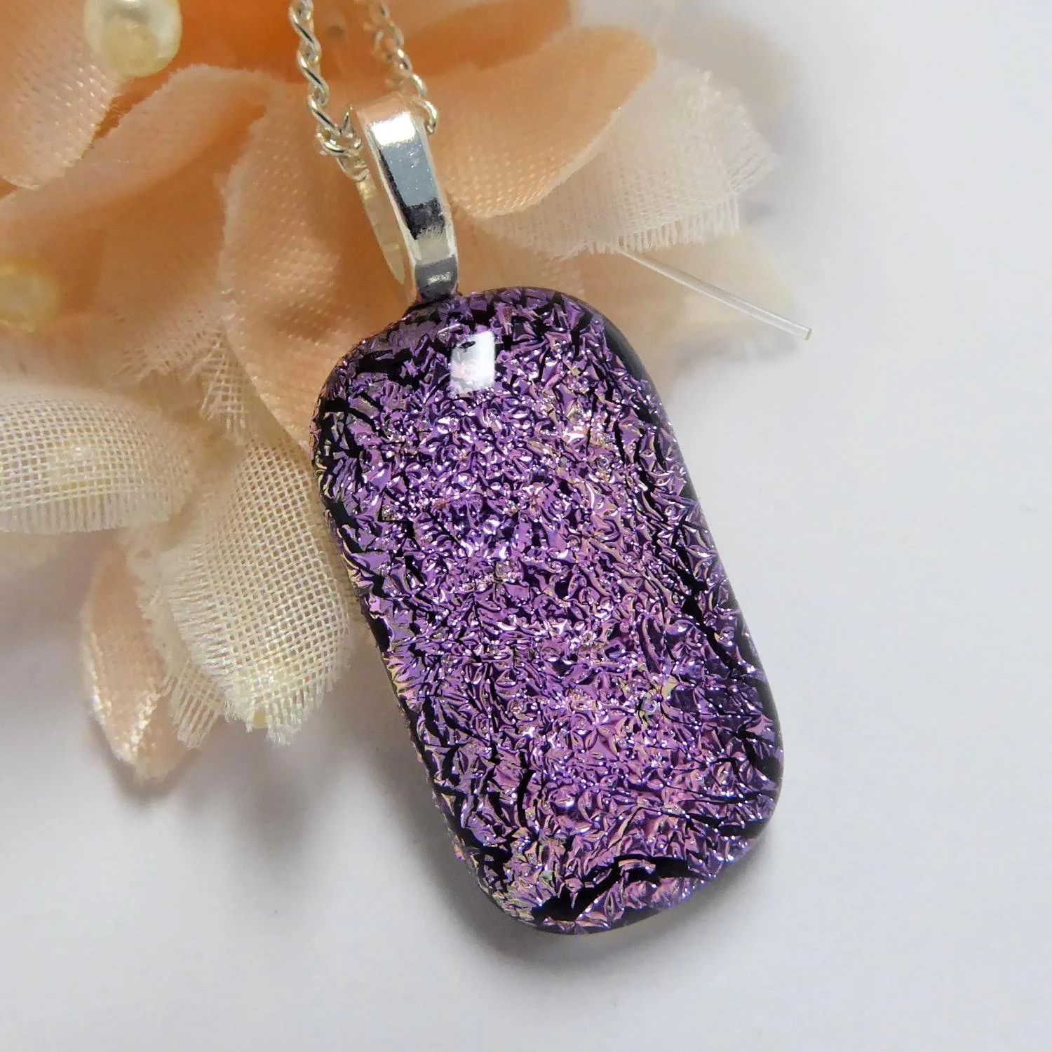  Pale pink dichroic glass fused glass pendant on chain 