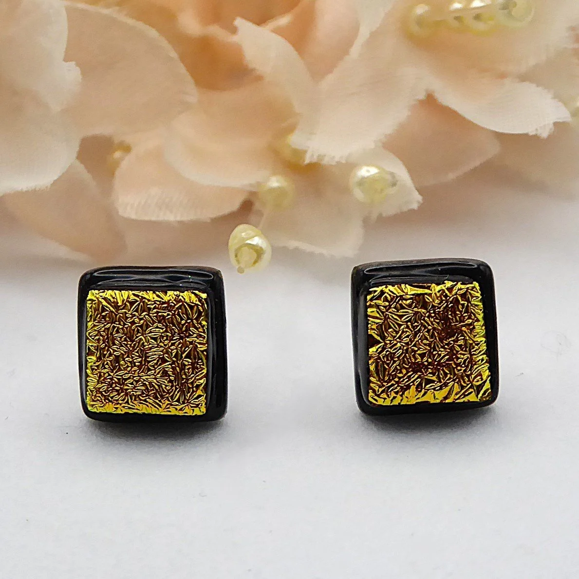  Square gold and black dichroic glass stud earrings. 