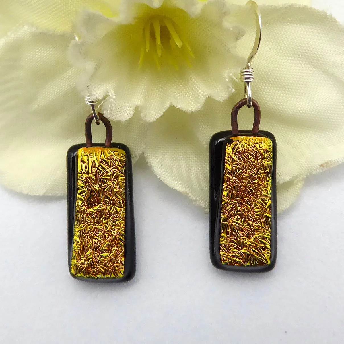  Dichroic glass earrings: textured gold glass fired onto black opaque glass in a dangle style 