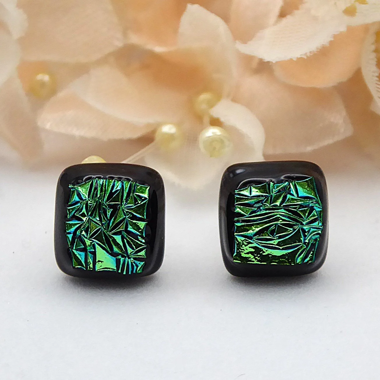  Fused glass stud earrings with textured green glass fired onto black glass 