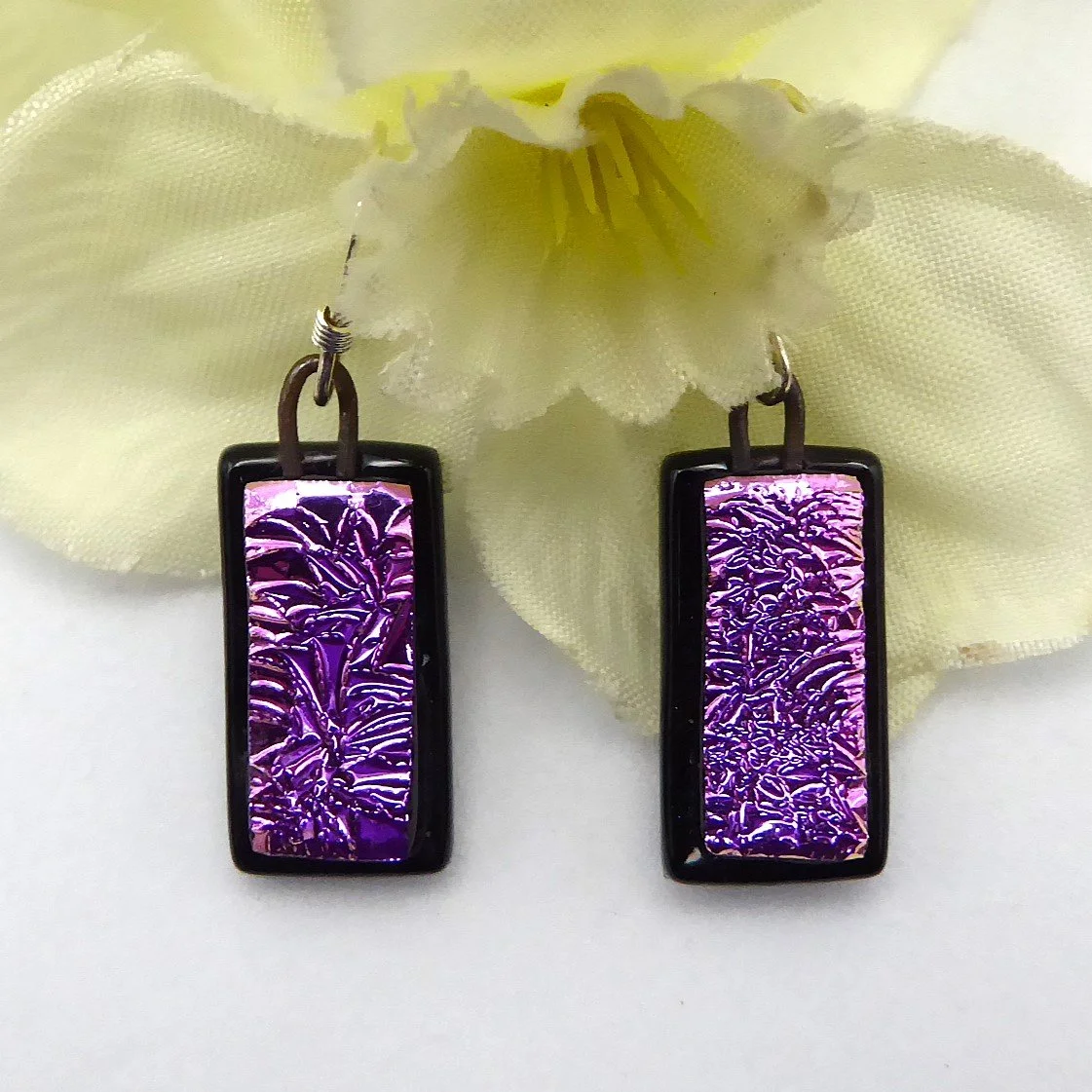  Pink and black fused glass earrings with textured pink dichroic glass fired onto black glass 