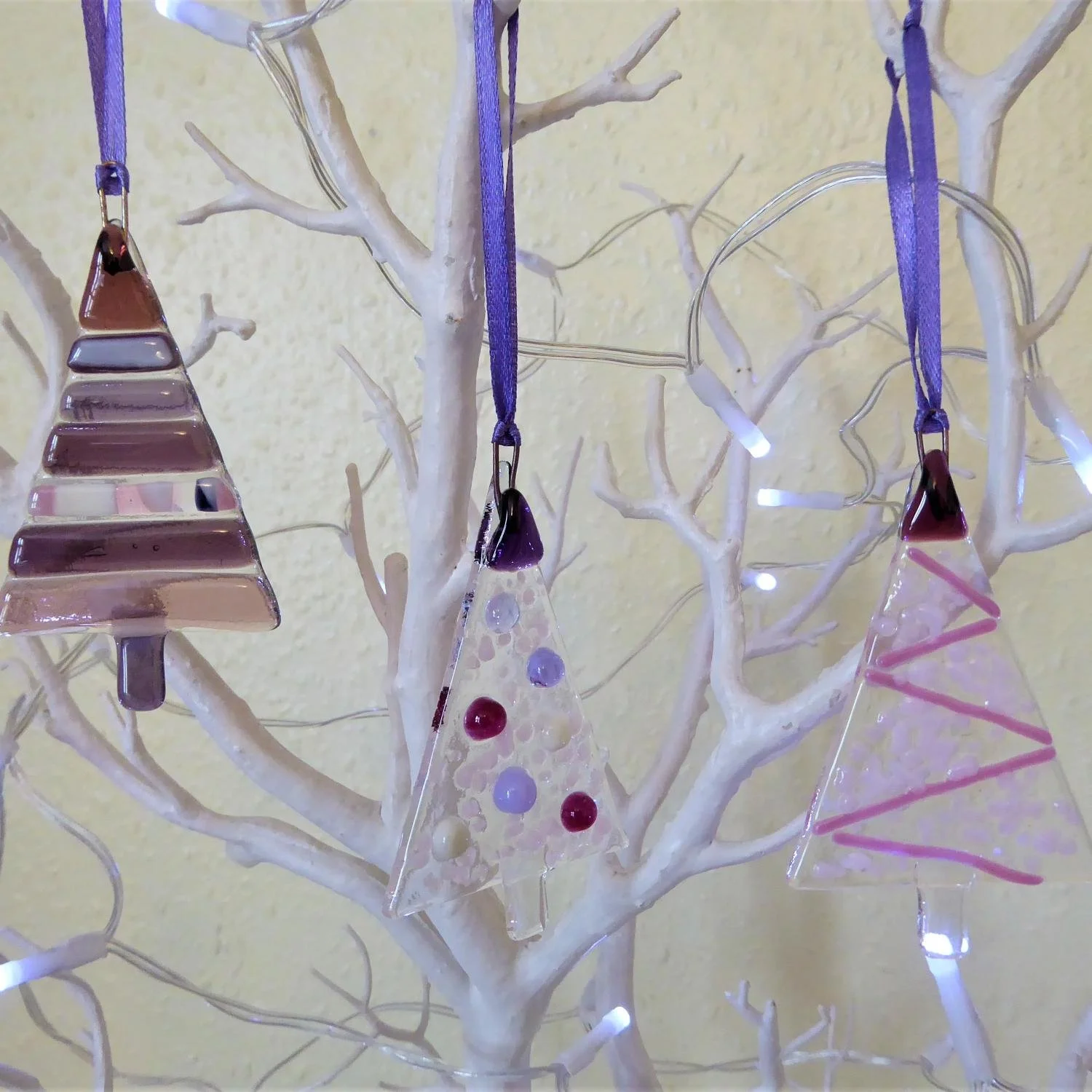  Three hanging fused glass Christmas decorations in pink and purple glass styes 