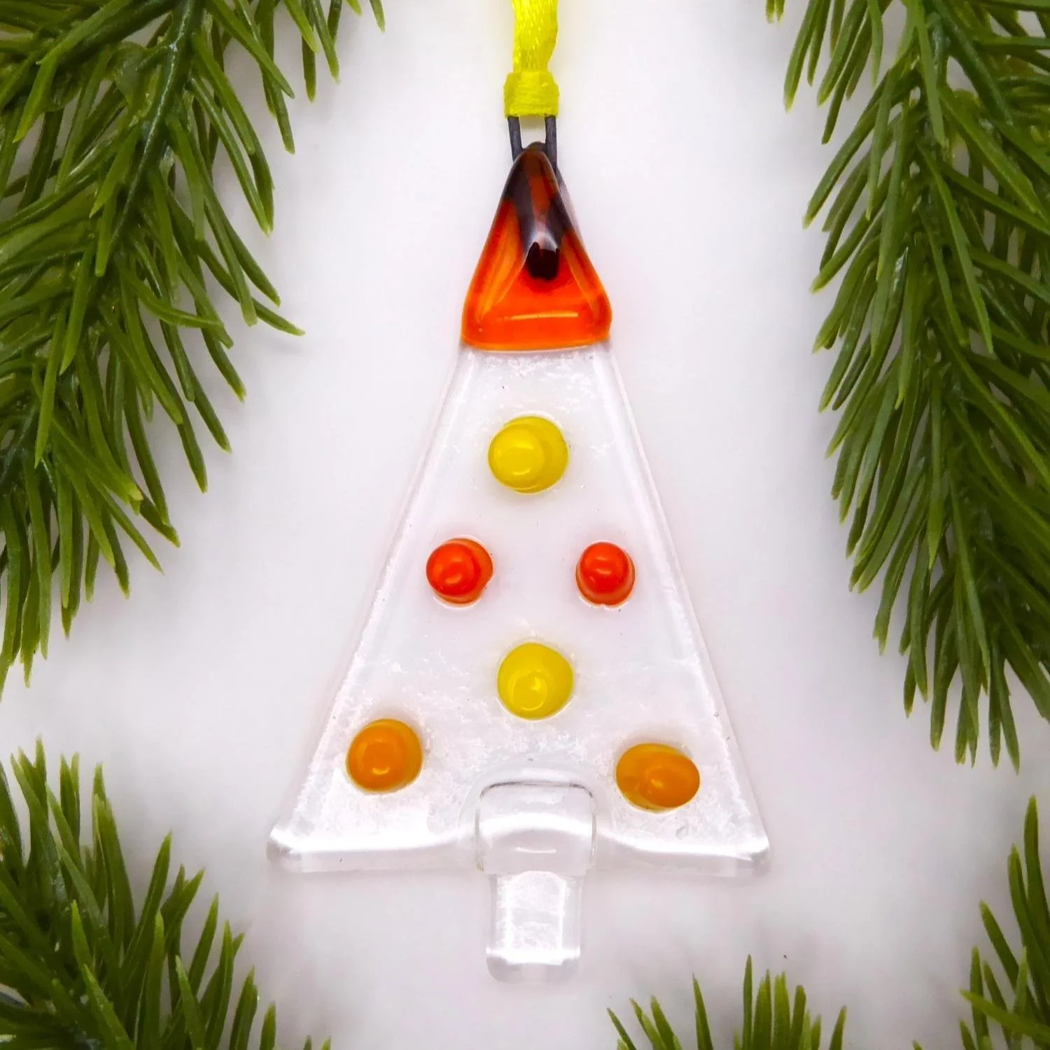  Fused glass Christmas tree shaped decoration with coloured dots in yellow and orange representing baubles 