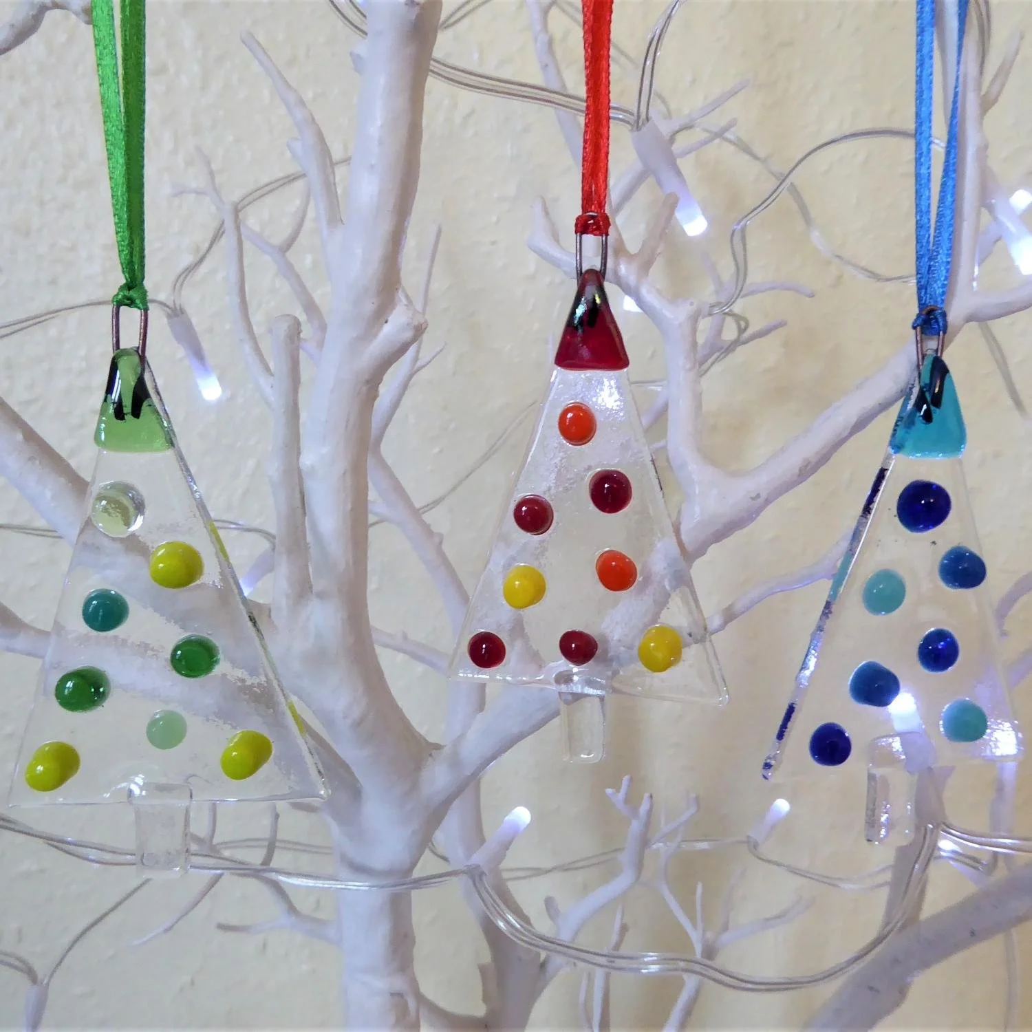  Hanging fused glass Christmas tree ornaments with coloured dots representing Christmas baubles. 