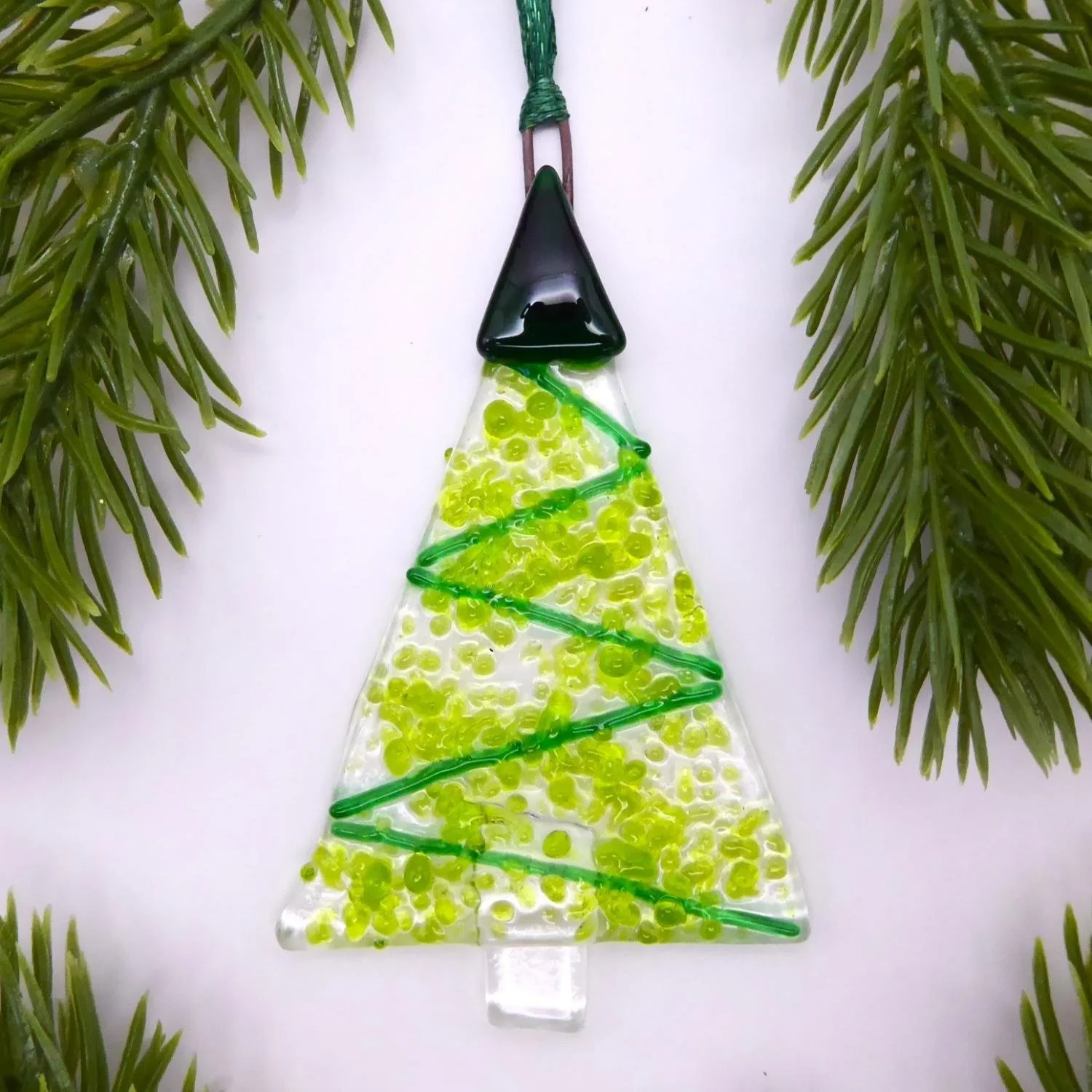  Fused glass Christmas tree ornament with a green tinsel design 
