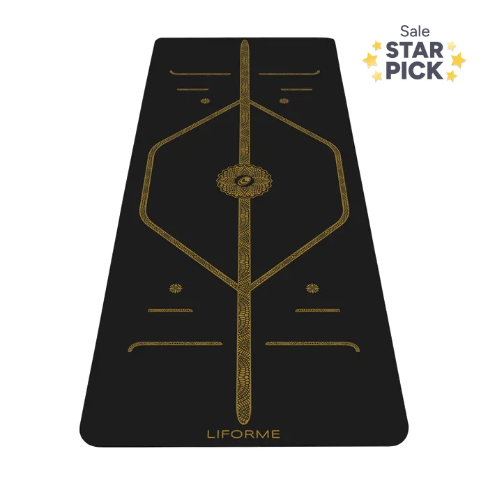 A black yoga mat with gold geometric patterns and the brand name Liforme at the bottom, designed for yoga practice.