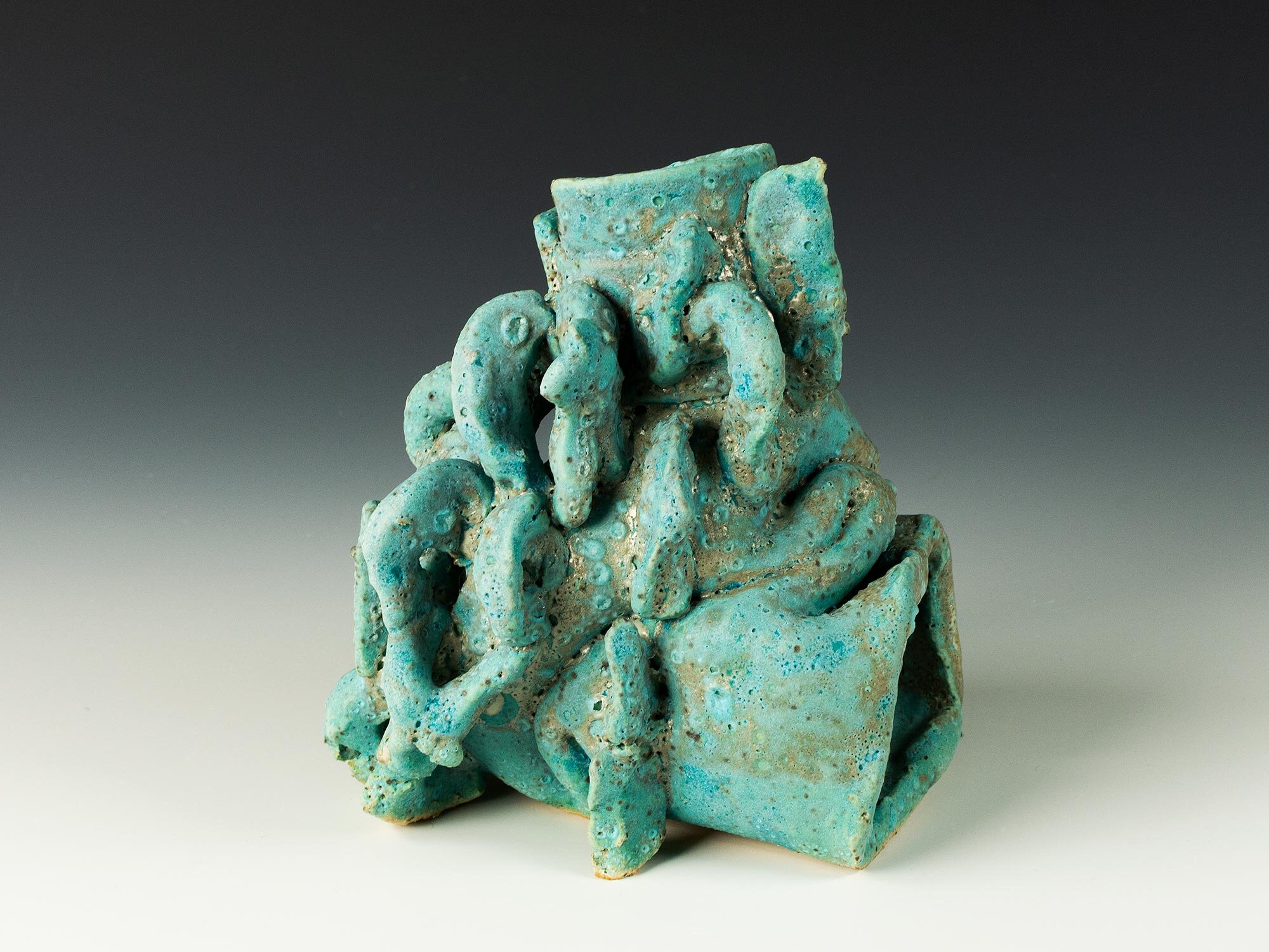 Jomon Ohr spotted turquoise 1.jpg