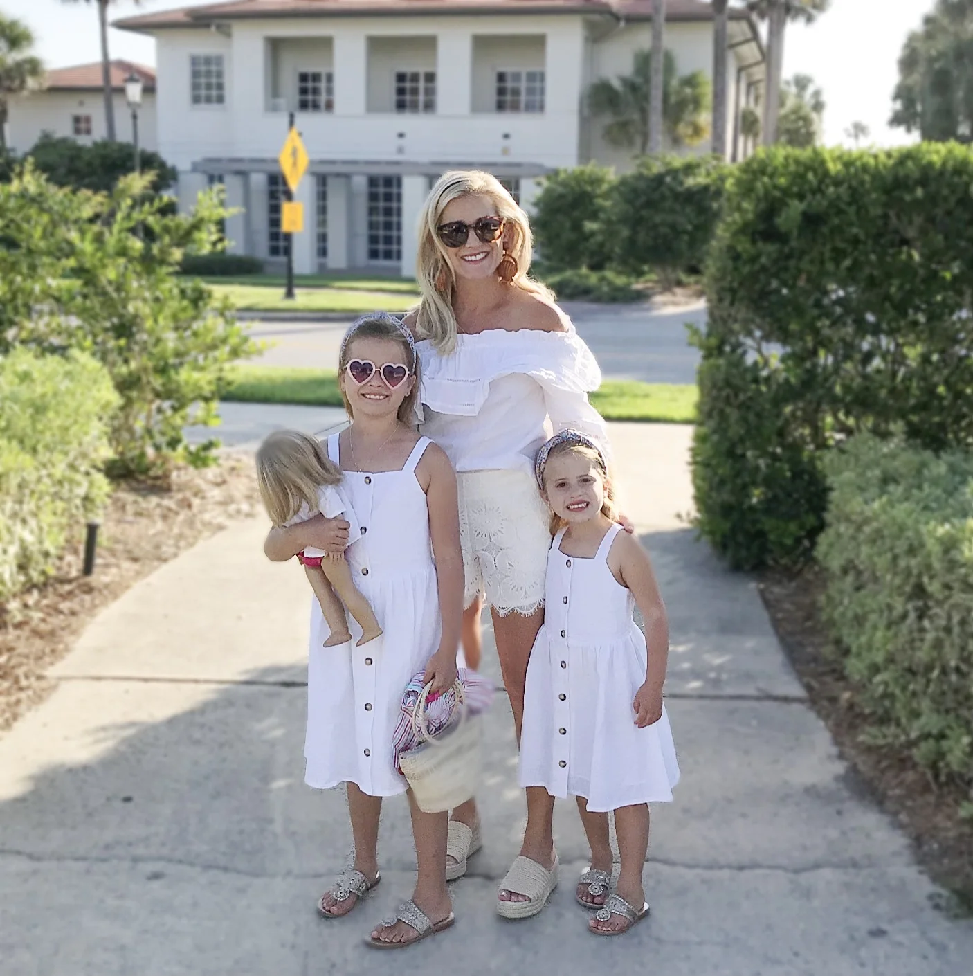 girl’s shoes / love these white dresses for the girl’s if the ones they are wearing are still sold out / girl’s dresses / headbands / my top / my shorts are old, but these are this year’s version / my shoes / shell earrings / my favorite sunglasses I wear all the time