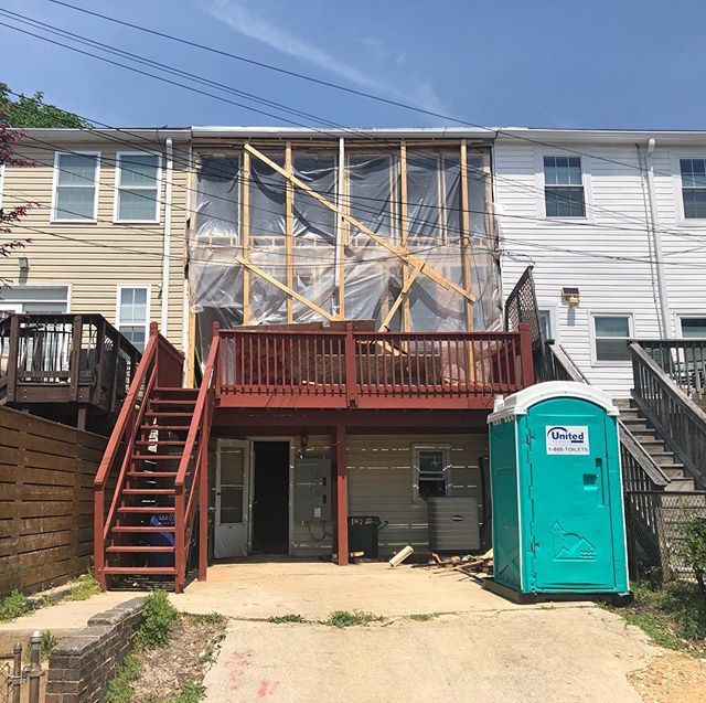 Lots of glass on the back of this rowhouse in Southeast will really stand out from the neighbors.