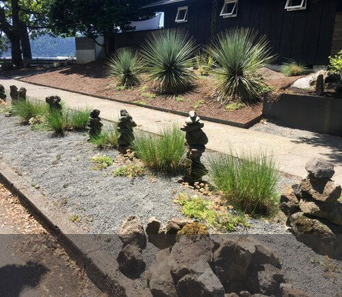 This strip, six feet wide and with no overhead powerlines could support a tree reaching over 50’ tall and shading pedestrians and cars.