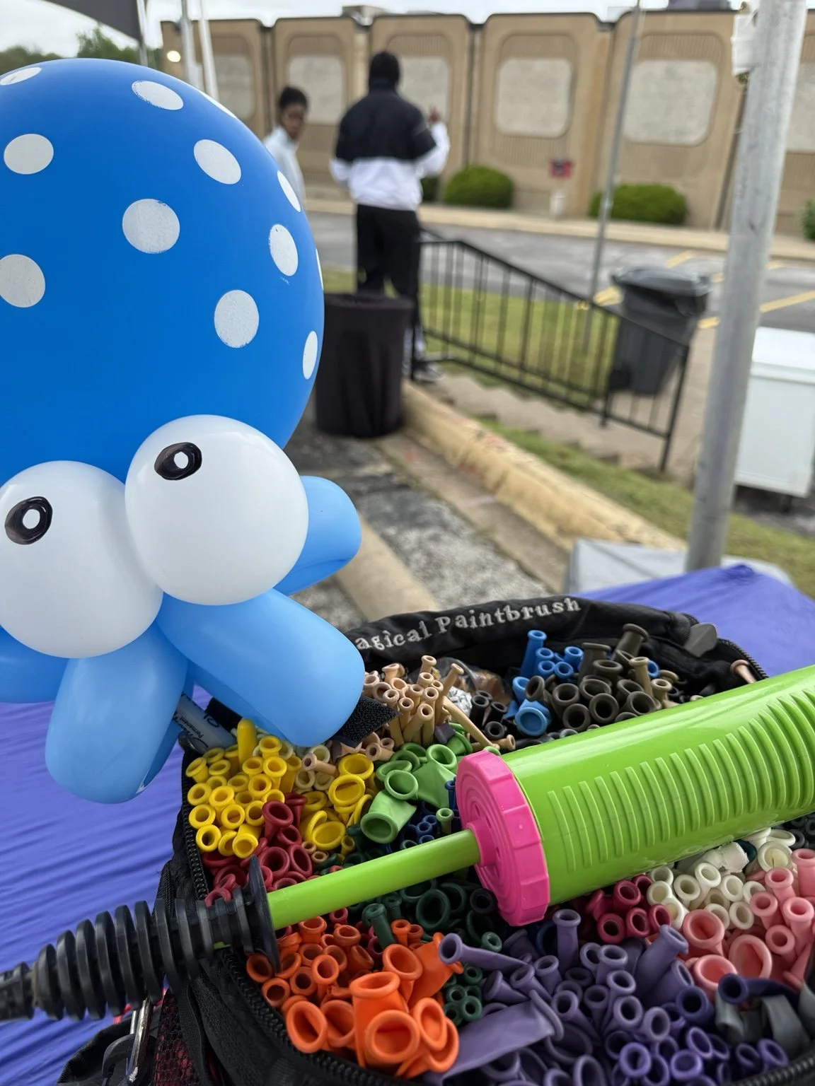 Blue balloon octopus at a community event