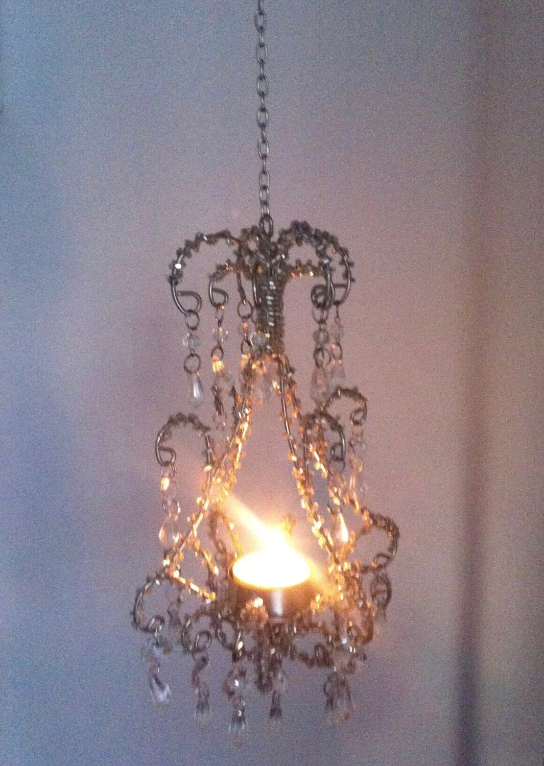 my chandelier, lit by a tealight