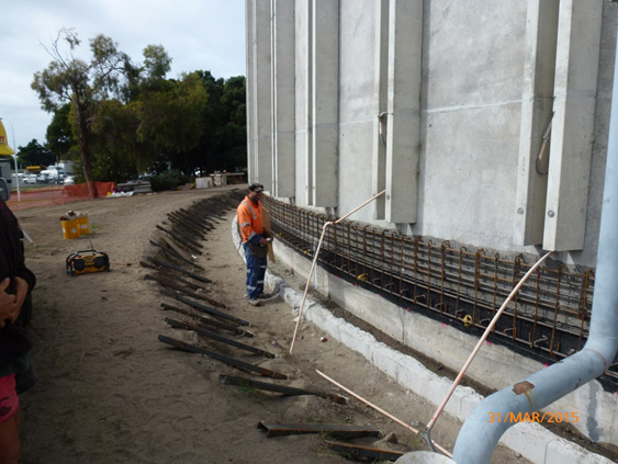 Concrete strengthening band under construction
