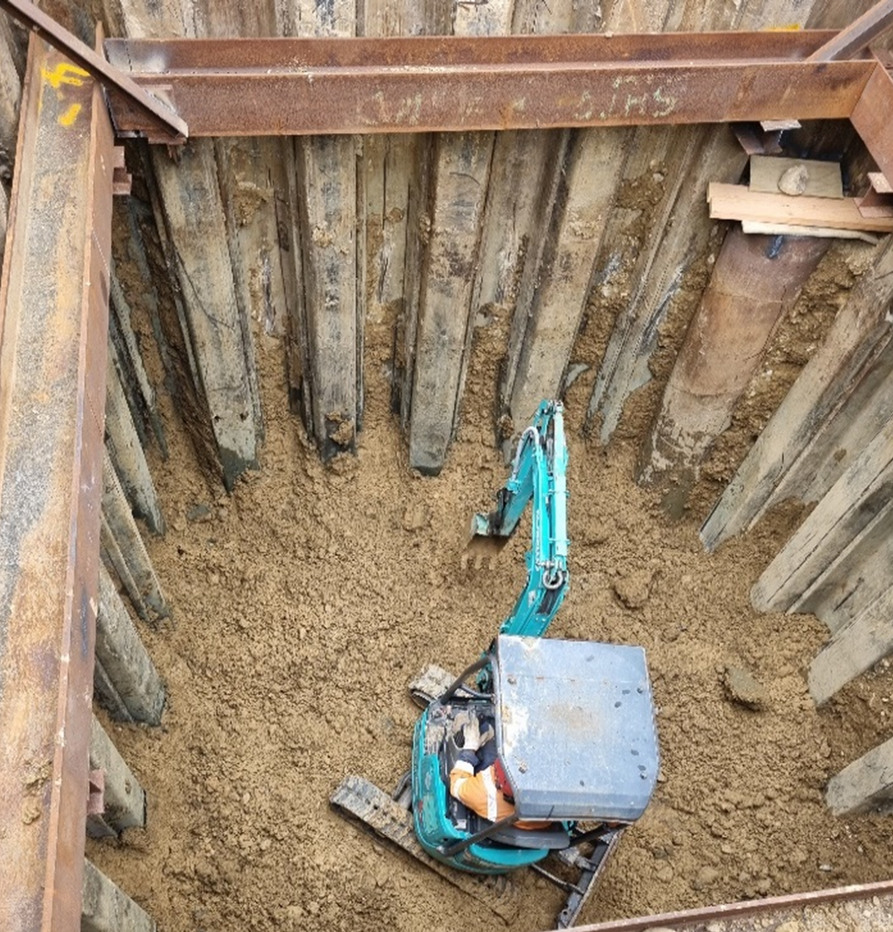 Sheet piled pit for wet well