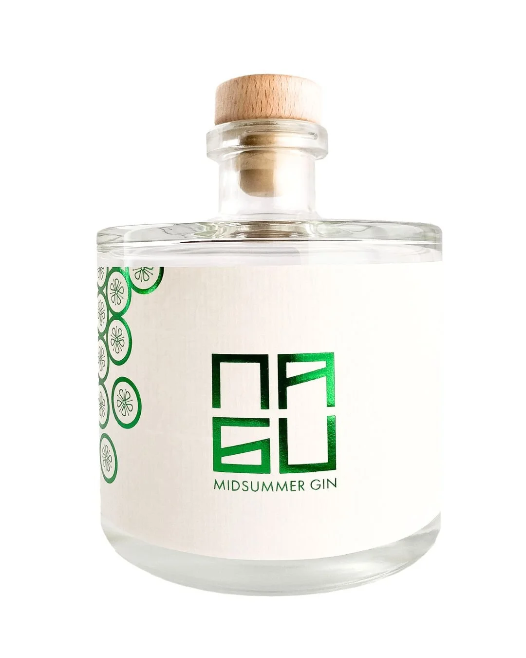A clear glass bottle with a wooden stopper, labeled "MIDSUMMER GIN" in green, with green circular floral designs on the side, set against a white background.