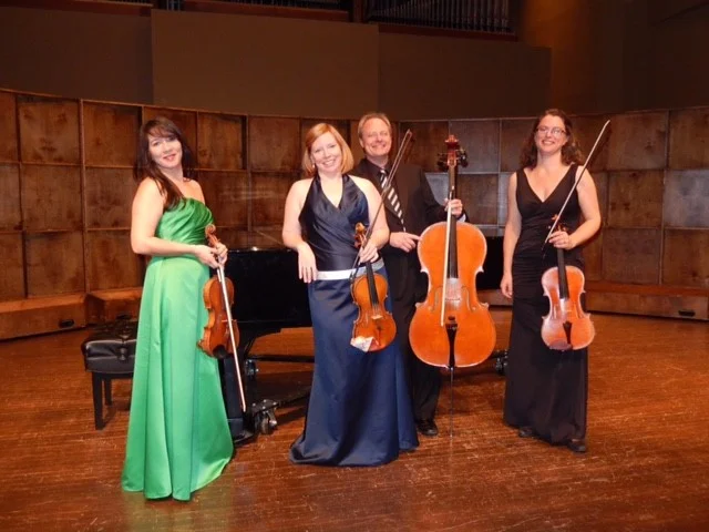 Atlantic String Quartet 2019 pic at piano.jpg