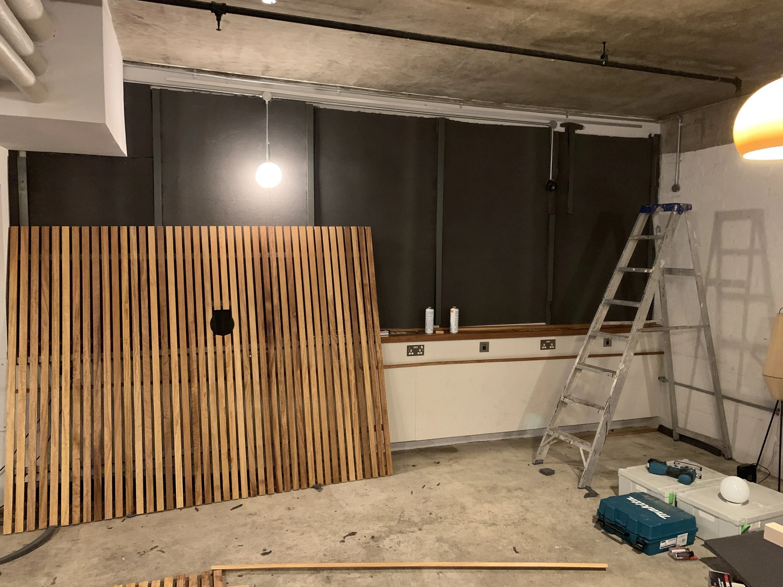 Iroko acoustic wall, Benk + Bo, Gravel Lane E1