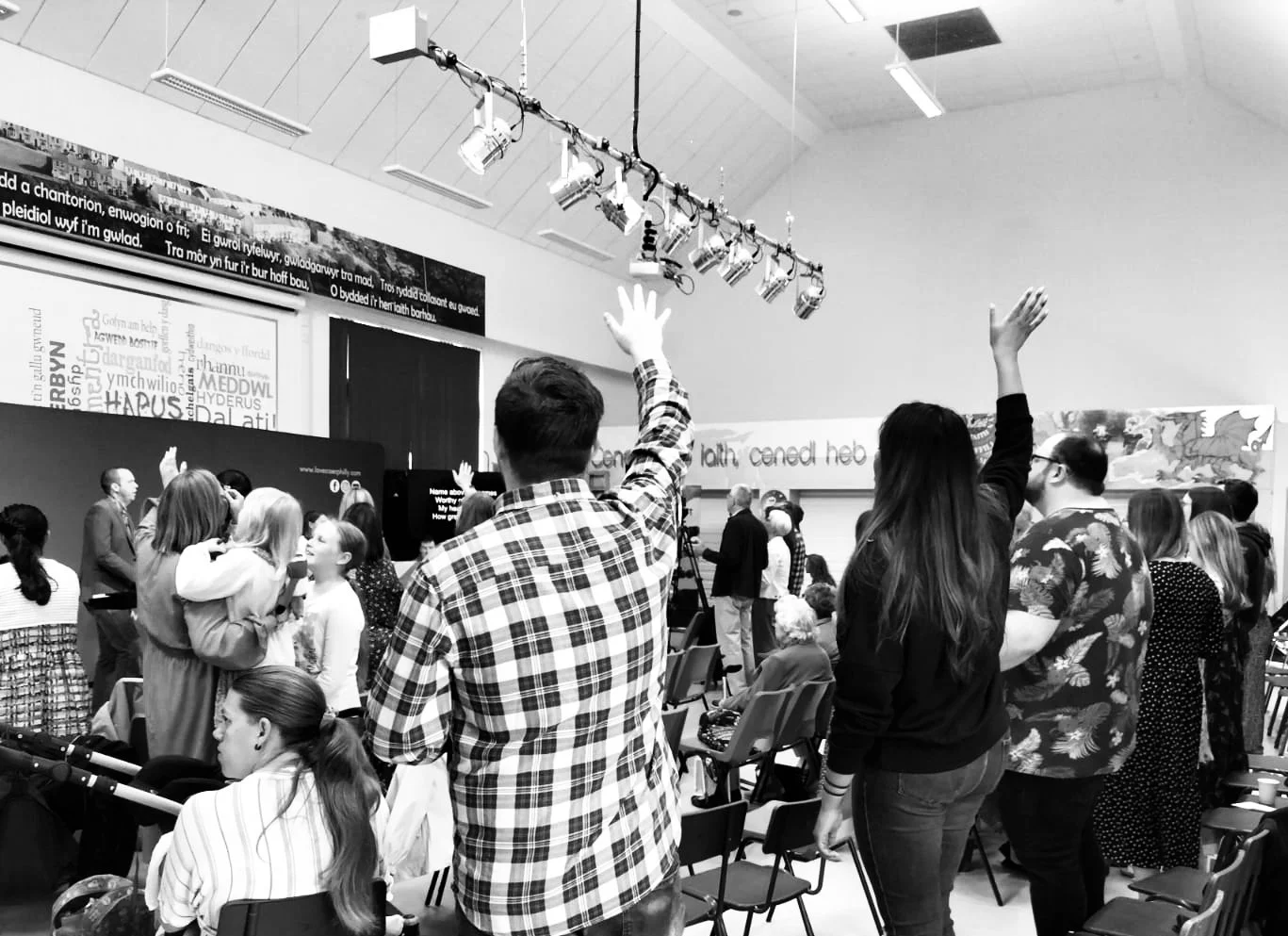 People worshipping at Love Caerphilly church