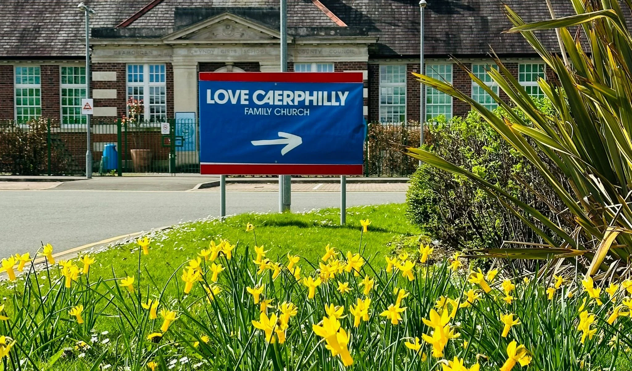 Large sign signalling the way to Love Caerphilly Church