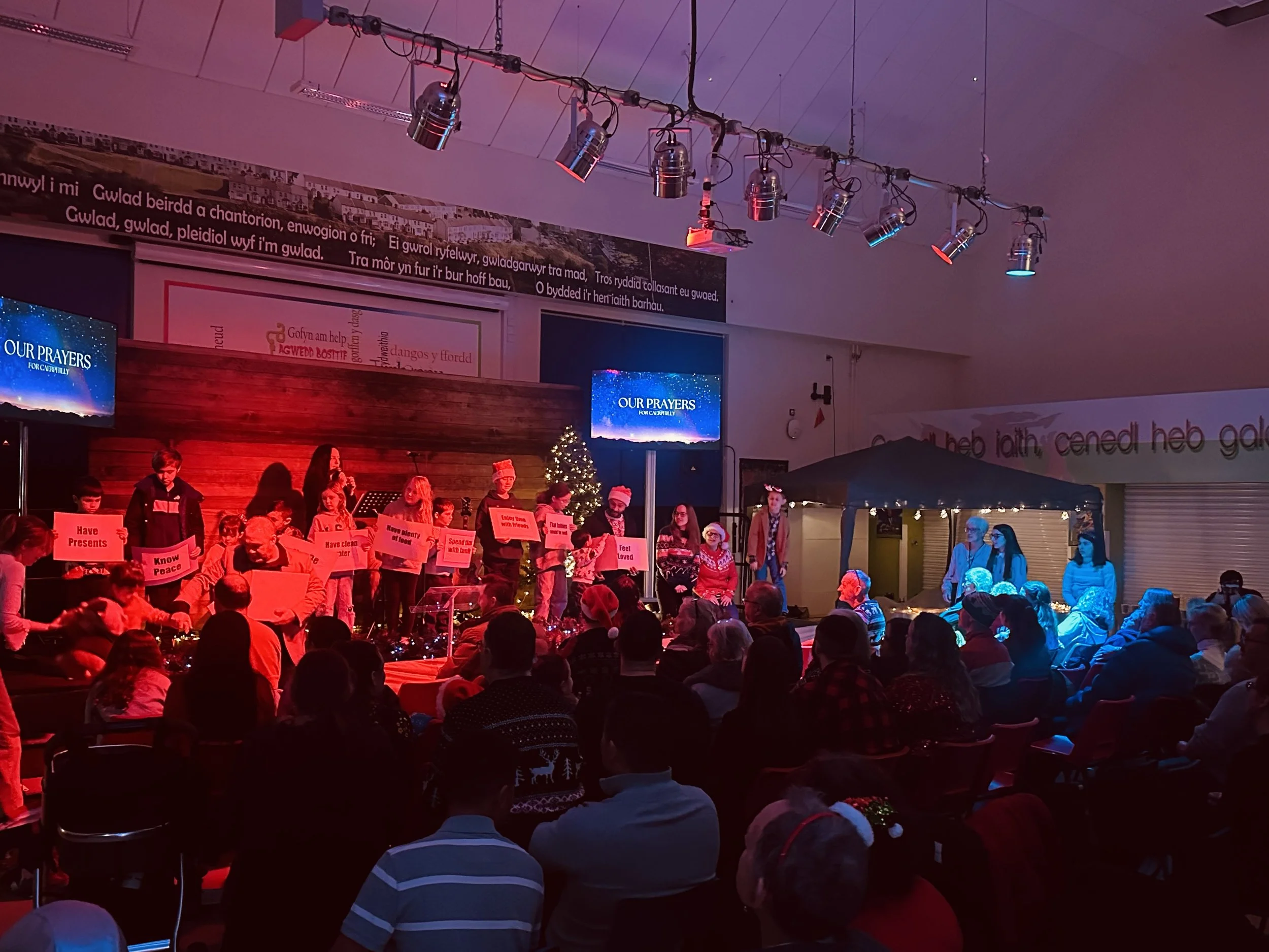 Large church group sing together in Caerphilly for Christmas