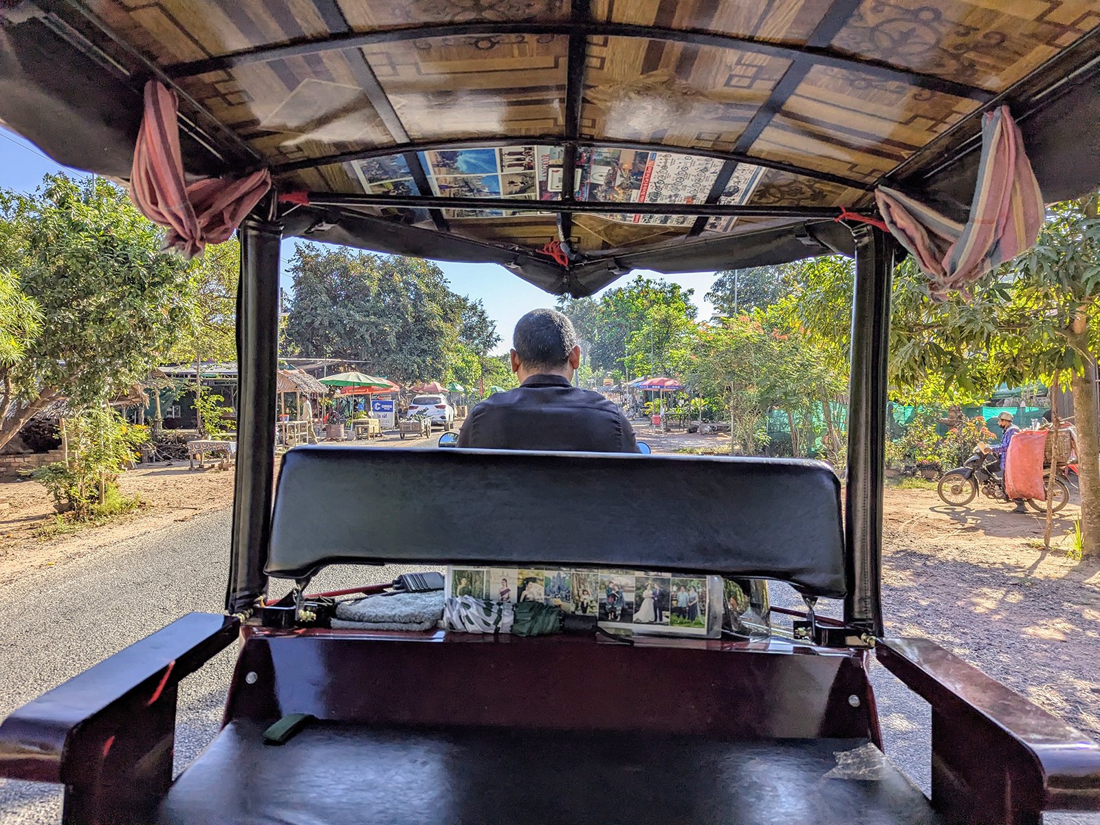 Riding in a tuk-tuk through Angkor, Cambodia (2025). Photo by Danny With Love.