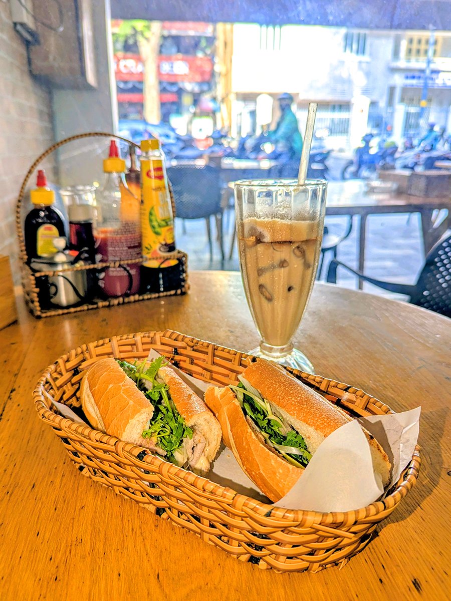 Bánh mì and iced Vietnamese coffee at Lebanhmi — Vietnamese Cuisine (Mặt Tiền), Saigon, Vietnam (2025). Photo by Danny With Love.