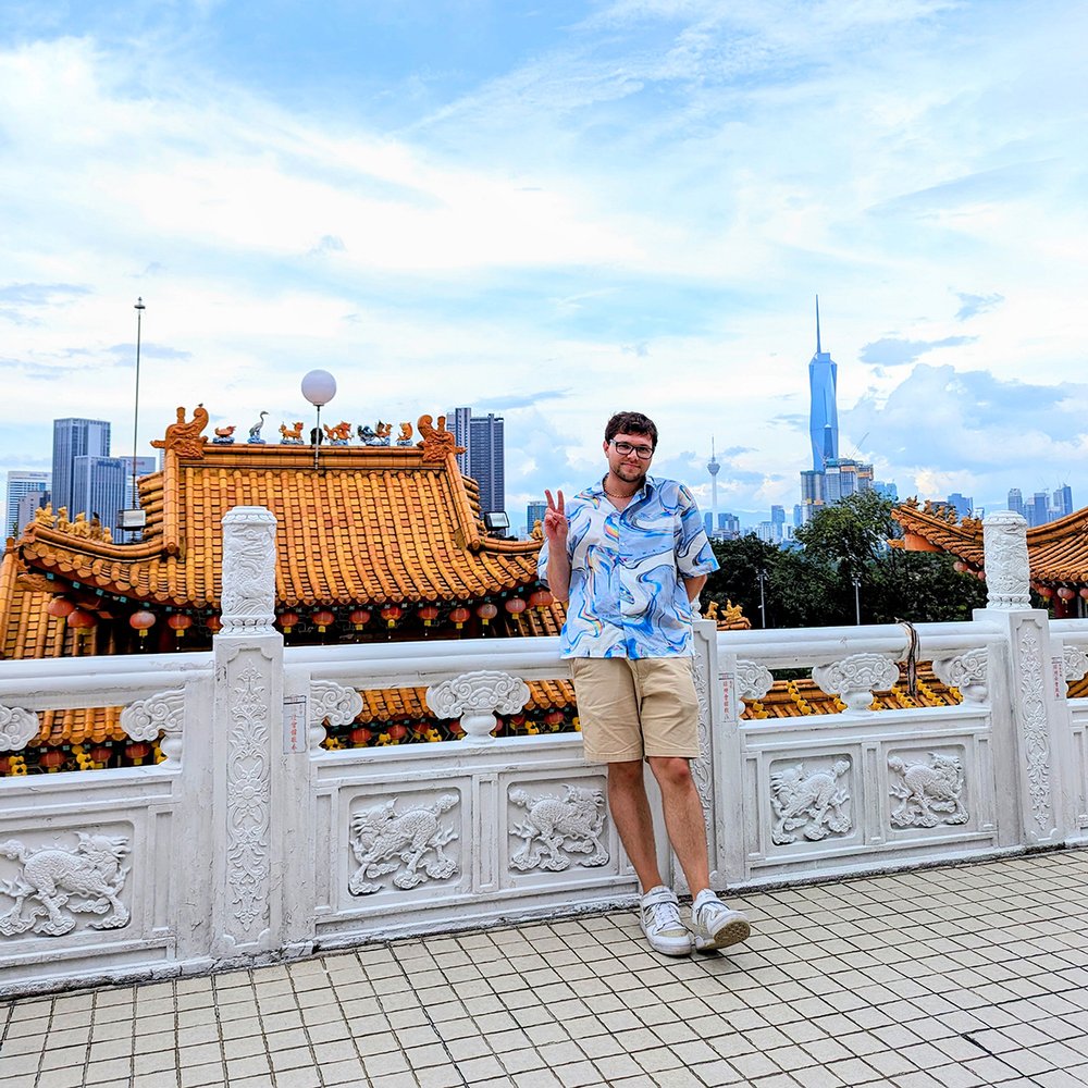  Posing at Thean Hou Temple with KL Tower and Merdeka 118 in the distance, Kuala Lumpur, Malaysia (2023). 