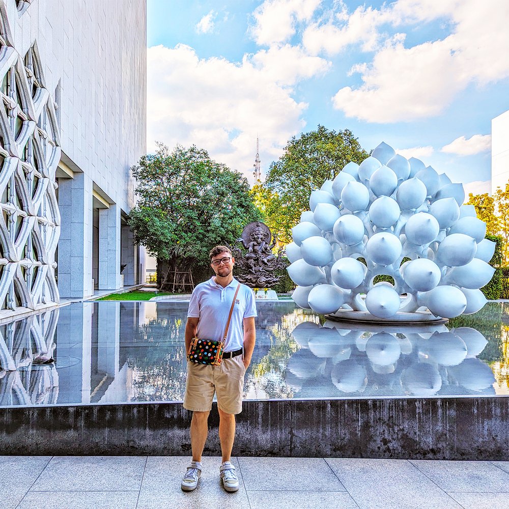 Posing outside the Museum of Contemporary Art, Bangkok, Thailand (2024). 