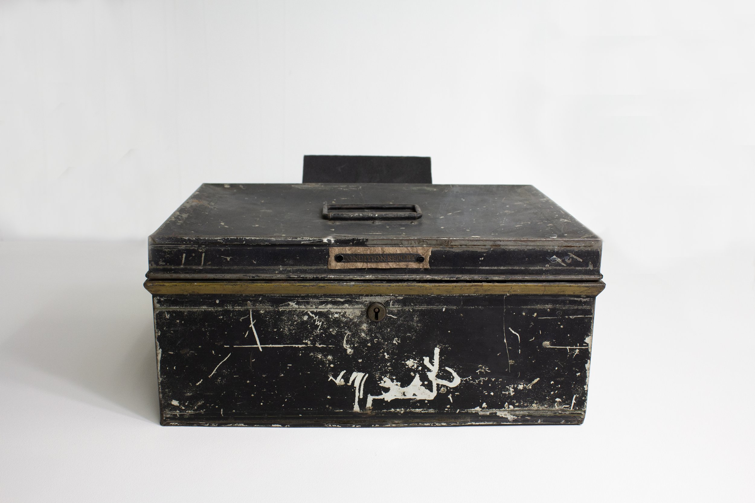 Early 20th century document box which houses book and objects