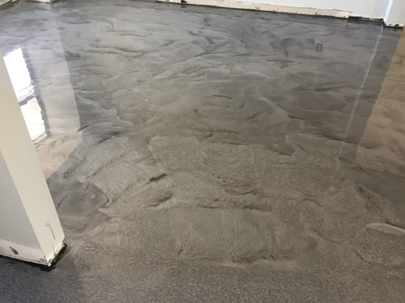  Residential flooring - polished concrete with metallic epoxy finish 