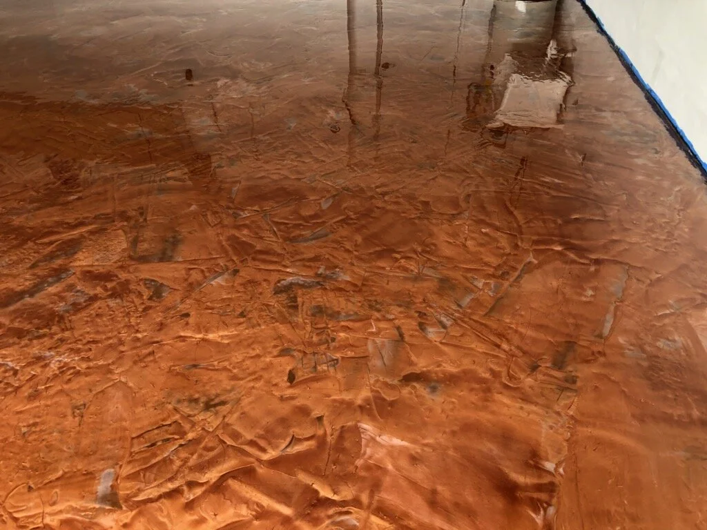  Garage floor - polished concrete with metallic epoxy finish - durable, resistant, and low maintenance 