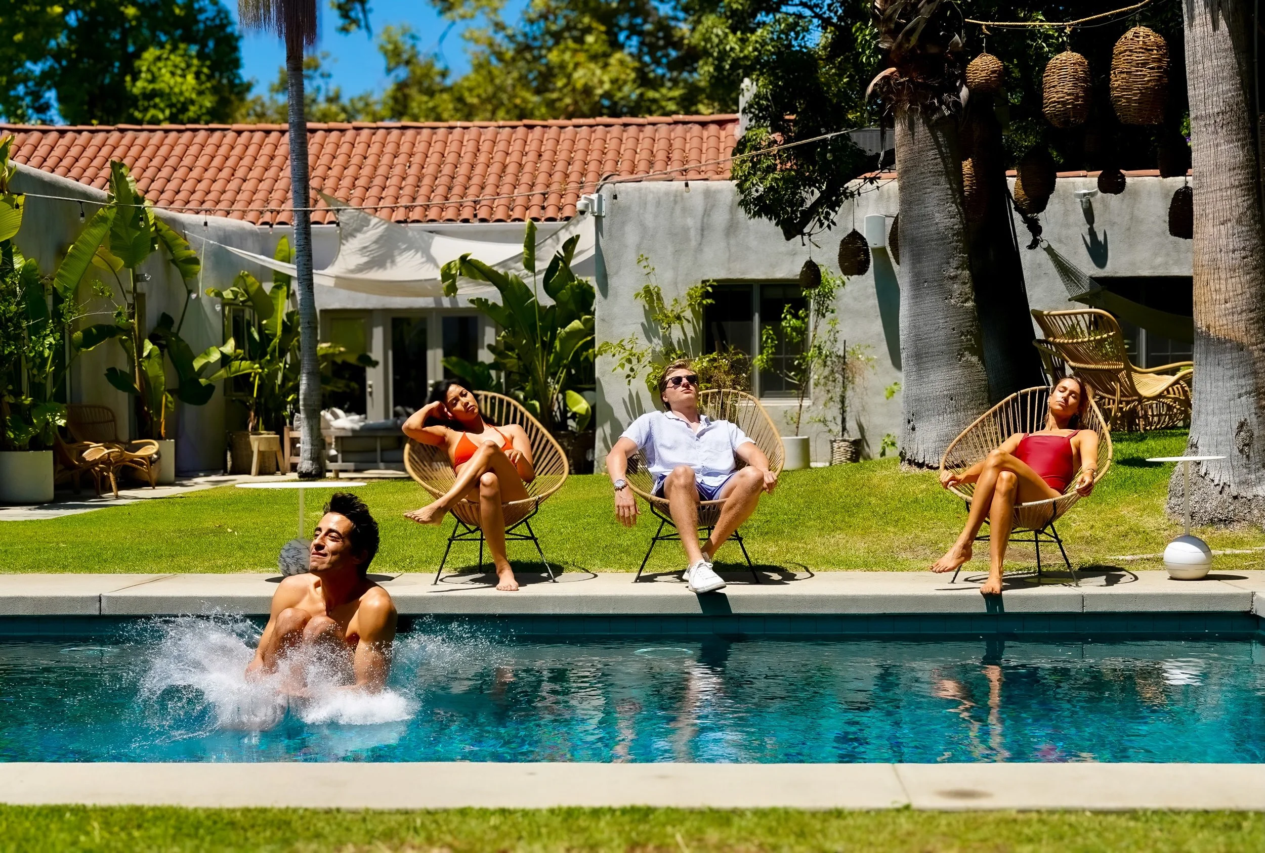 Lifestyle photography of products in use pool side Palm Springs 
