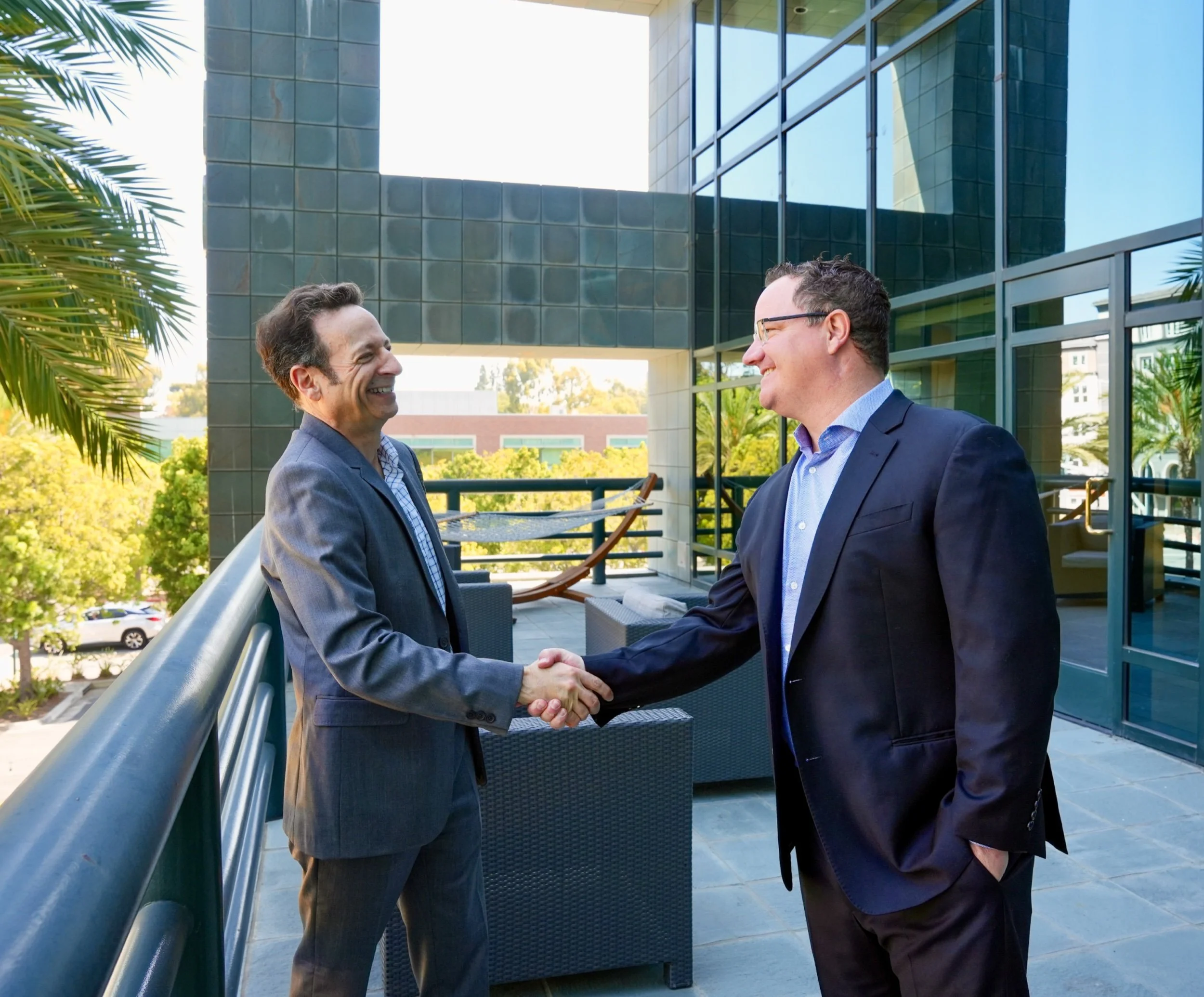 Corporate Lifestyle Photography of Executives Shaking Hands 