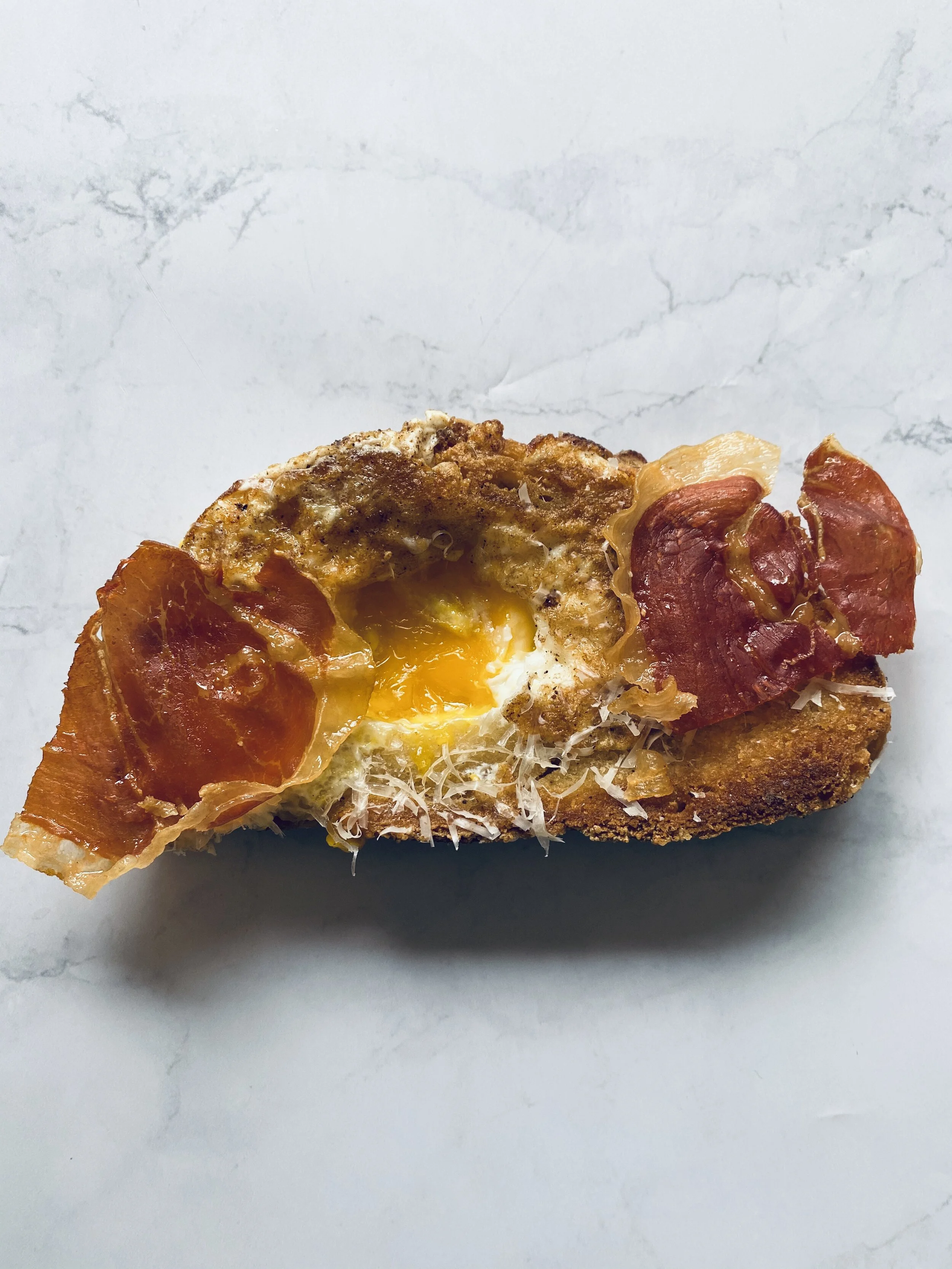 Parmesan Eggs in A Hole with Crispy Prosciutto
