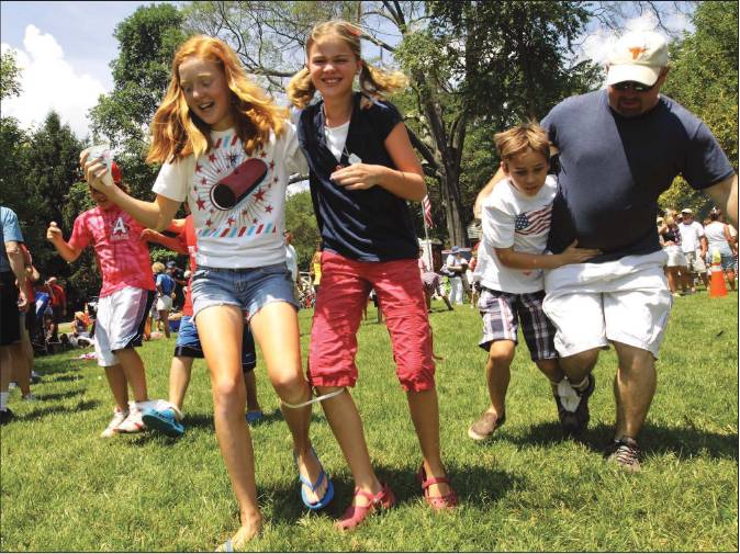 July 4 two girls in one-legged race.jpg