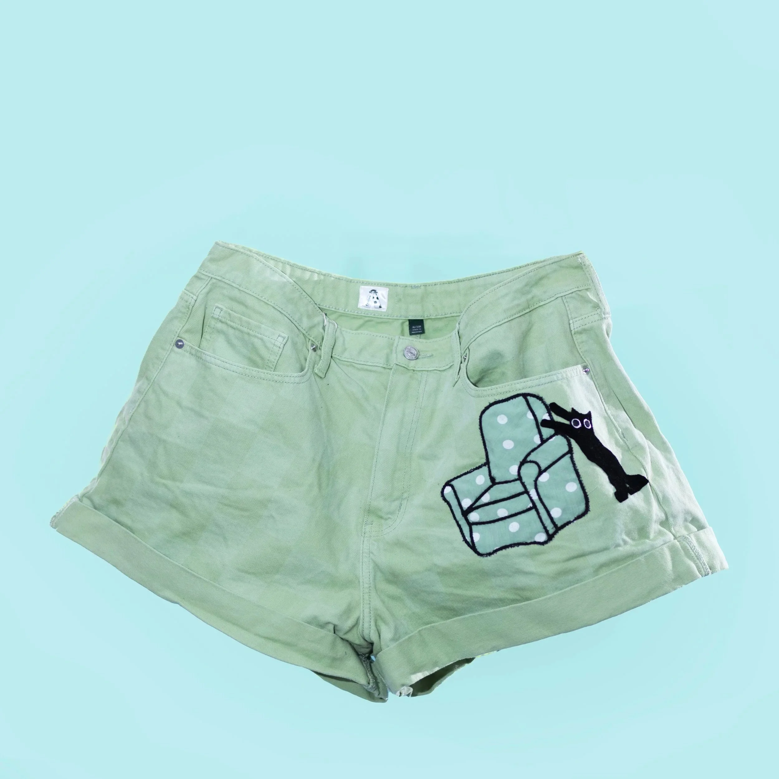 green checkered shorts sofa graphic kitty black cat polkadot.jpg