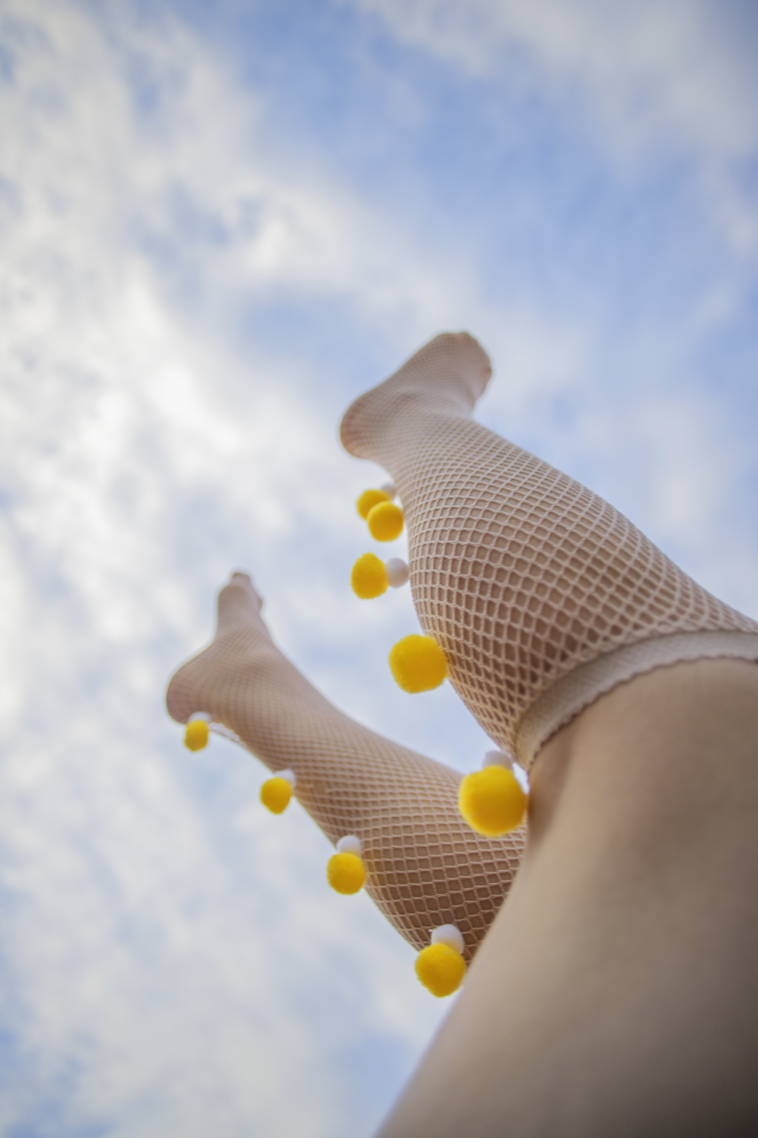 nude stockings with pink puff 