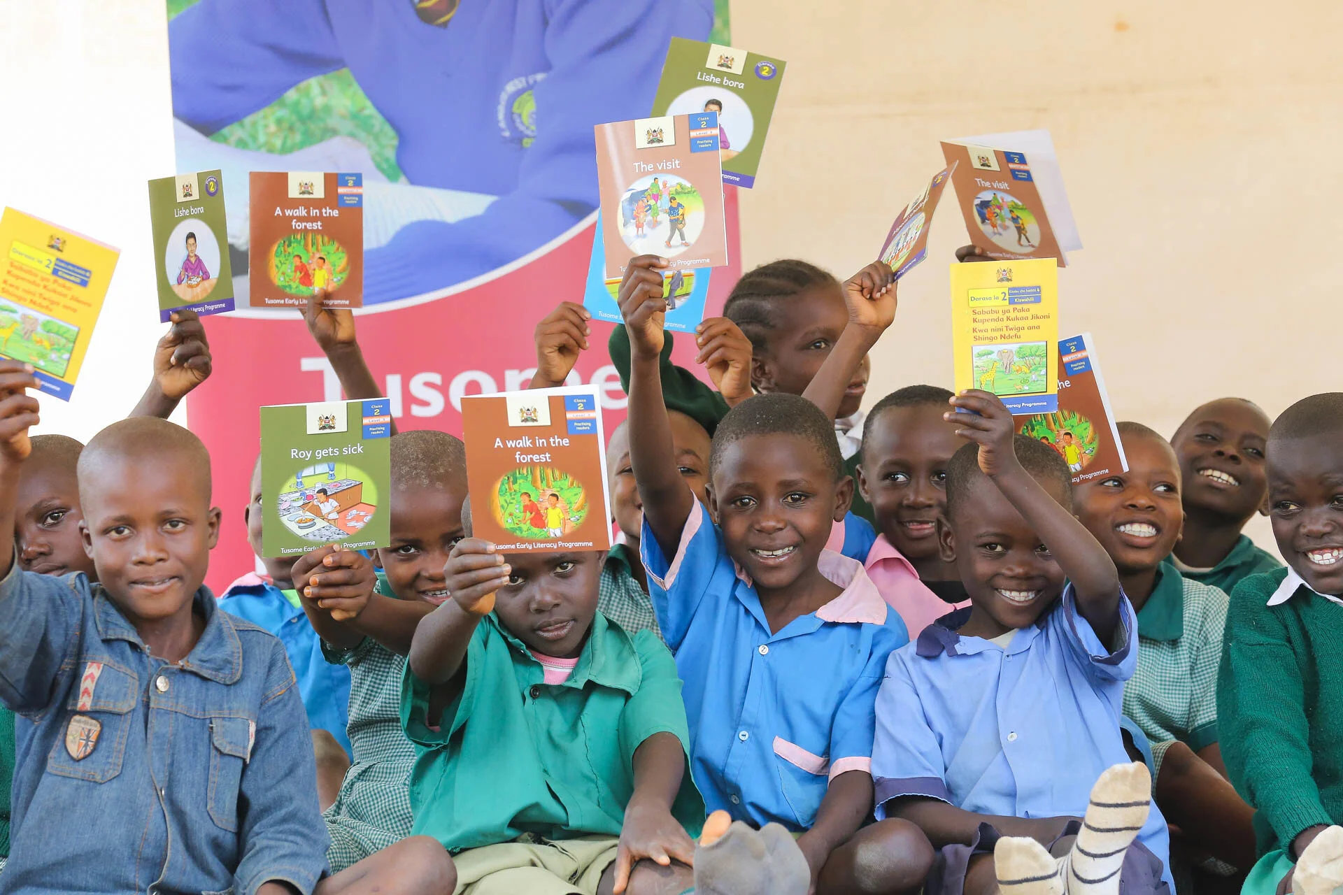 Identifying the Essential Ingredients to Literacy and Numeracy Improvement: Teacher Professional Development and Coaching, Student textbooks, and Structured Teachers’ Guides.
