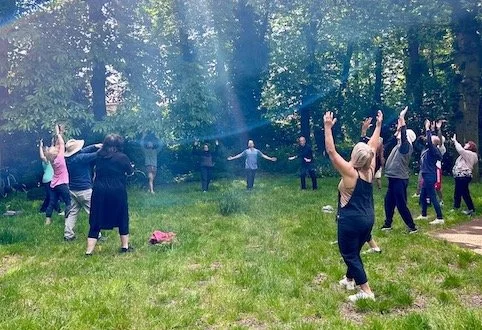 Outdoor Qigong practice in a garden, Bournemouth — What Beauty Moves series September 2026