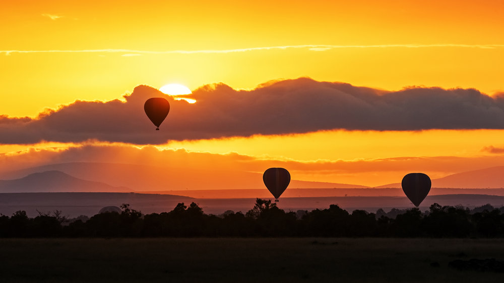 Hot Air Balloons in Surise Orange Africa Sky.jpg