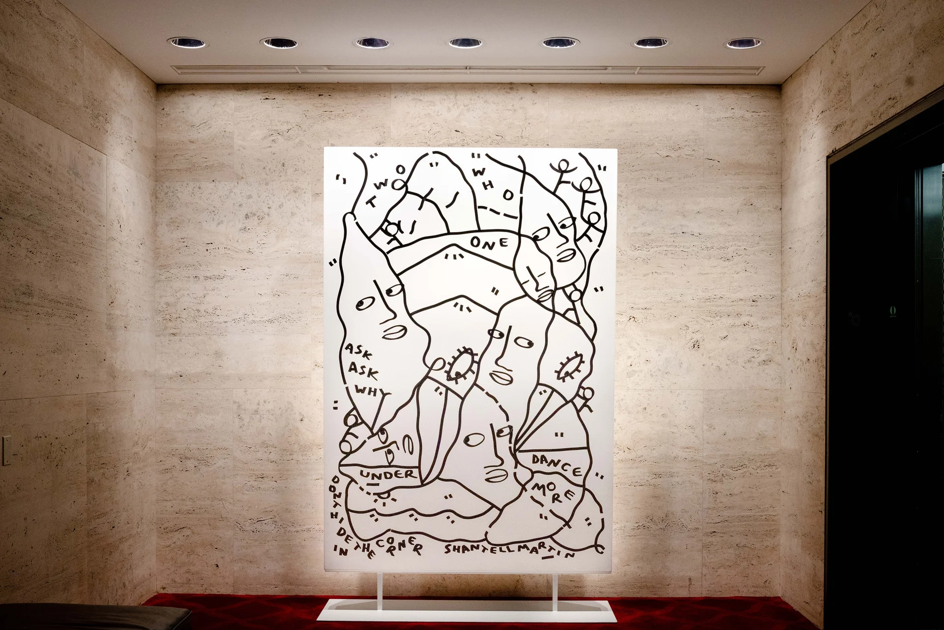 A modern abstract artwork featuring interconnected face outlines with text in black lines on a white background.