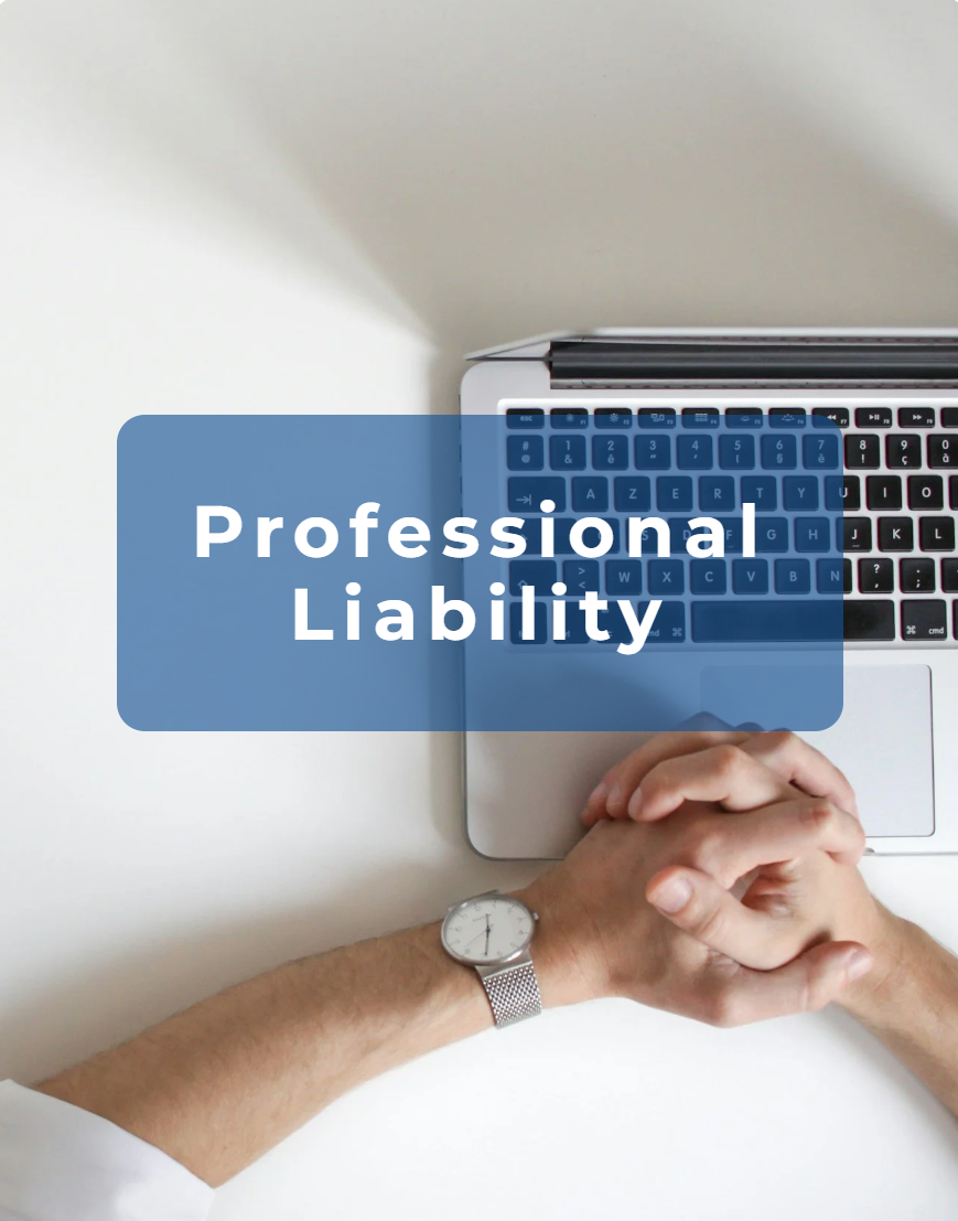 Close-up of a person with clasped hands and a silver wristwatch, sitting at a desk with a silver laptop showing a blue overlay with the text 'Professional Liability'.
