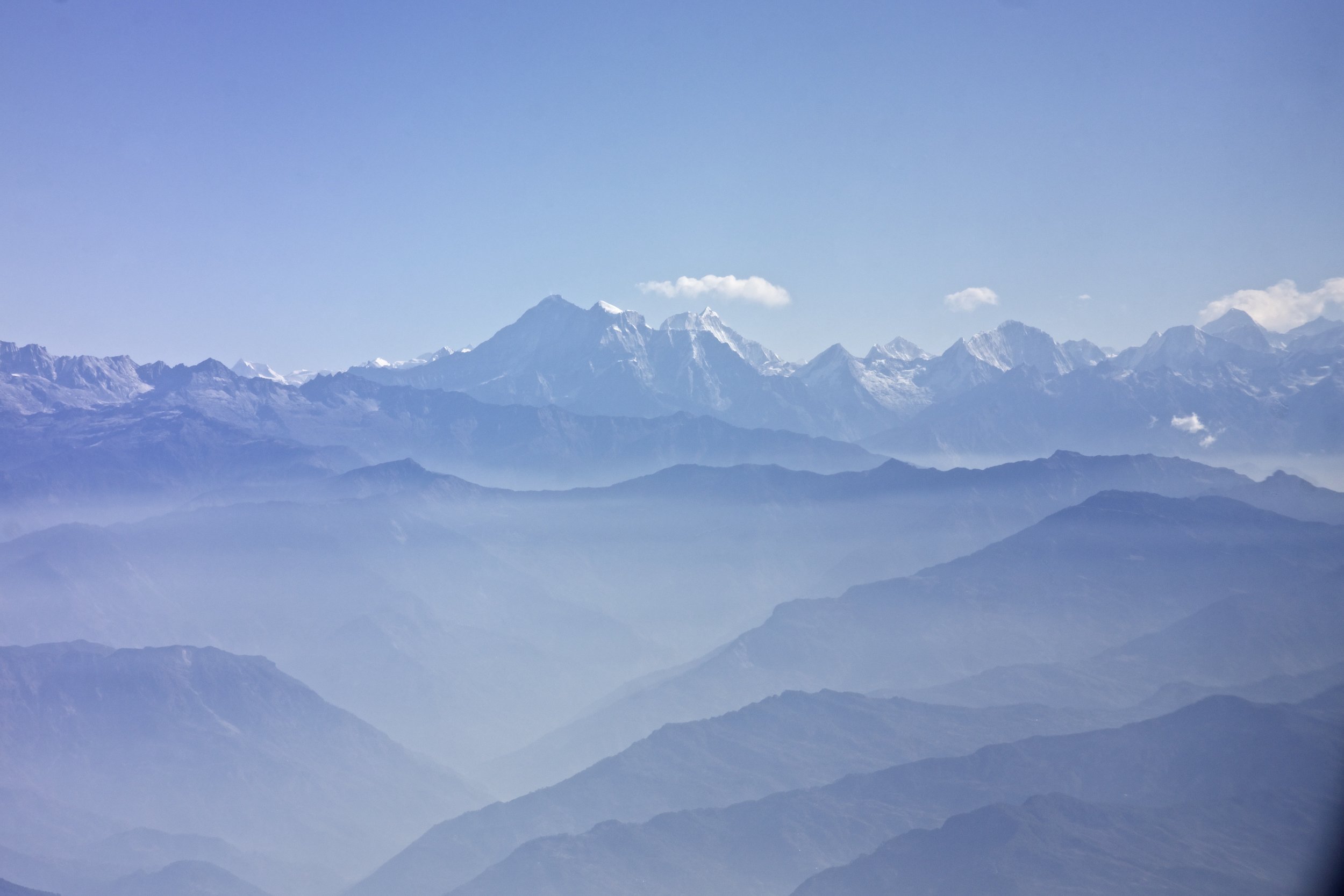 Sun flooding the valleys between each mountain range (PC: MyBhutan’s DeSantis)